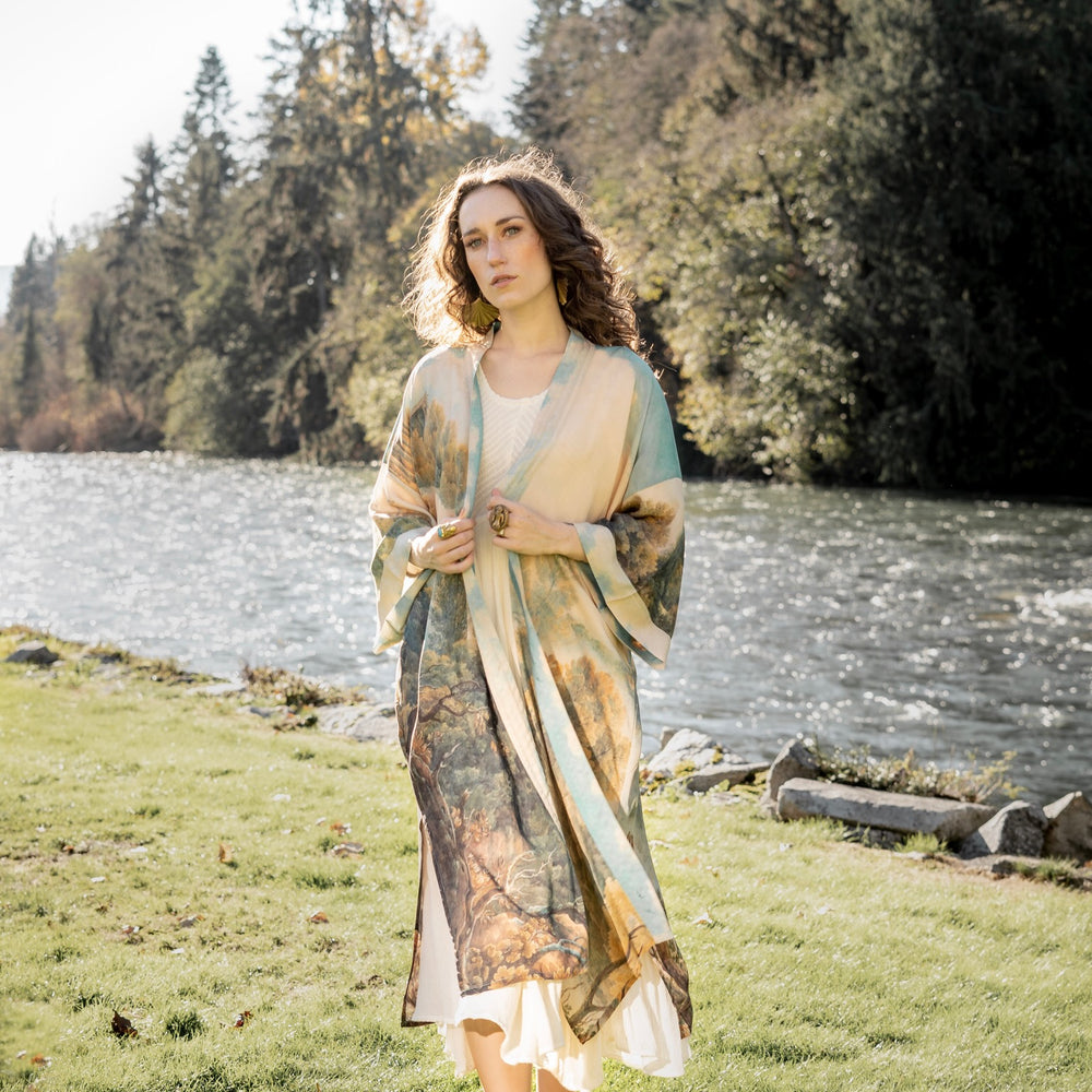 
                  
                    Romantic kimono featuring 18th-century Tivoli waterfalls and Lady Liberty art in a soft, painterly palette celebrating strength and self-love – Market of Stars.
                  
                