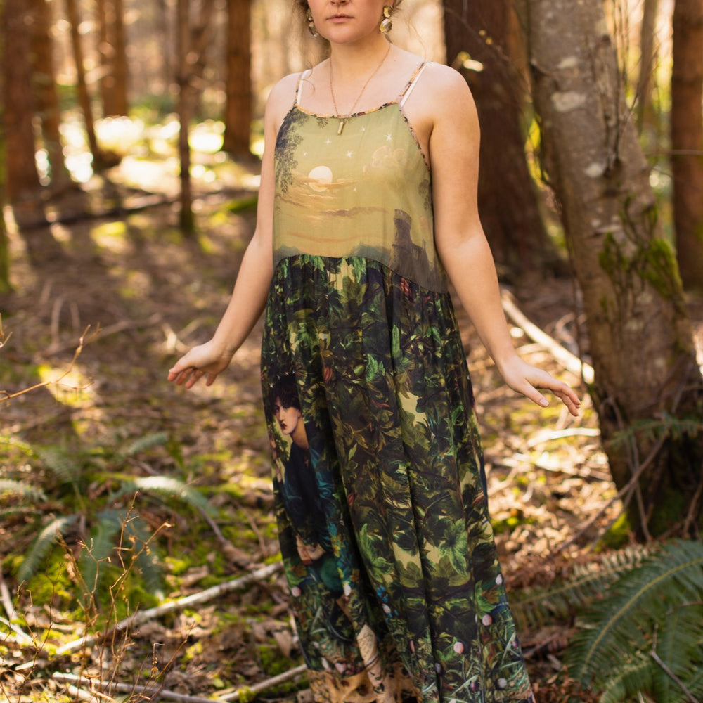 A romantic bamboo-based viscose slip dress featuring a moonlit river scene, a seated woman painted by Dante Gabriel Rossetti, and a hidden quote from a 1700s ring – Market of