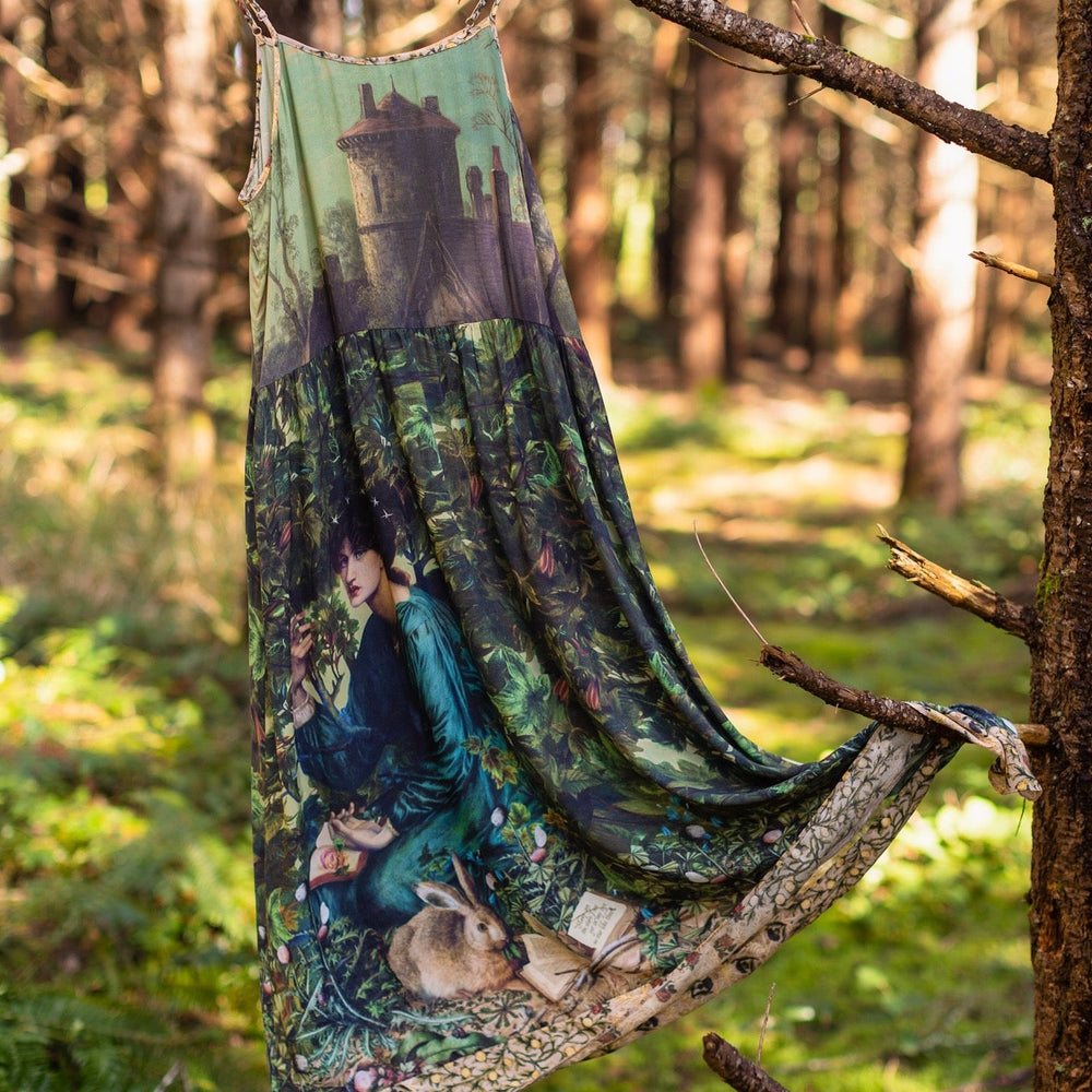 
                  
                    A romantic bamboo-based viscose slip dress featuring a moonlit river scene, a seated woman painted by Dante Gabriel Rossetti, and a hidden quote from a 1700s ring – Market of
                  
                