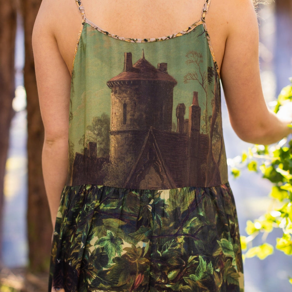 
                  
                    A romantic bamboo-based viscose slip dress featuring a moonlit river scene, a seated woman painted by Dante Gabriel Rossetti, and a hidden quote from a 1700s ring – Market of
                  
                