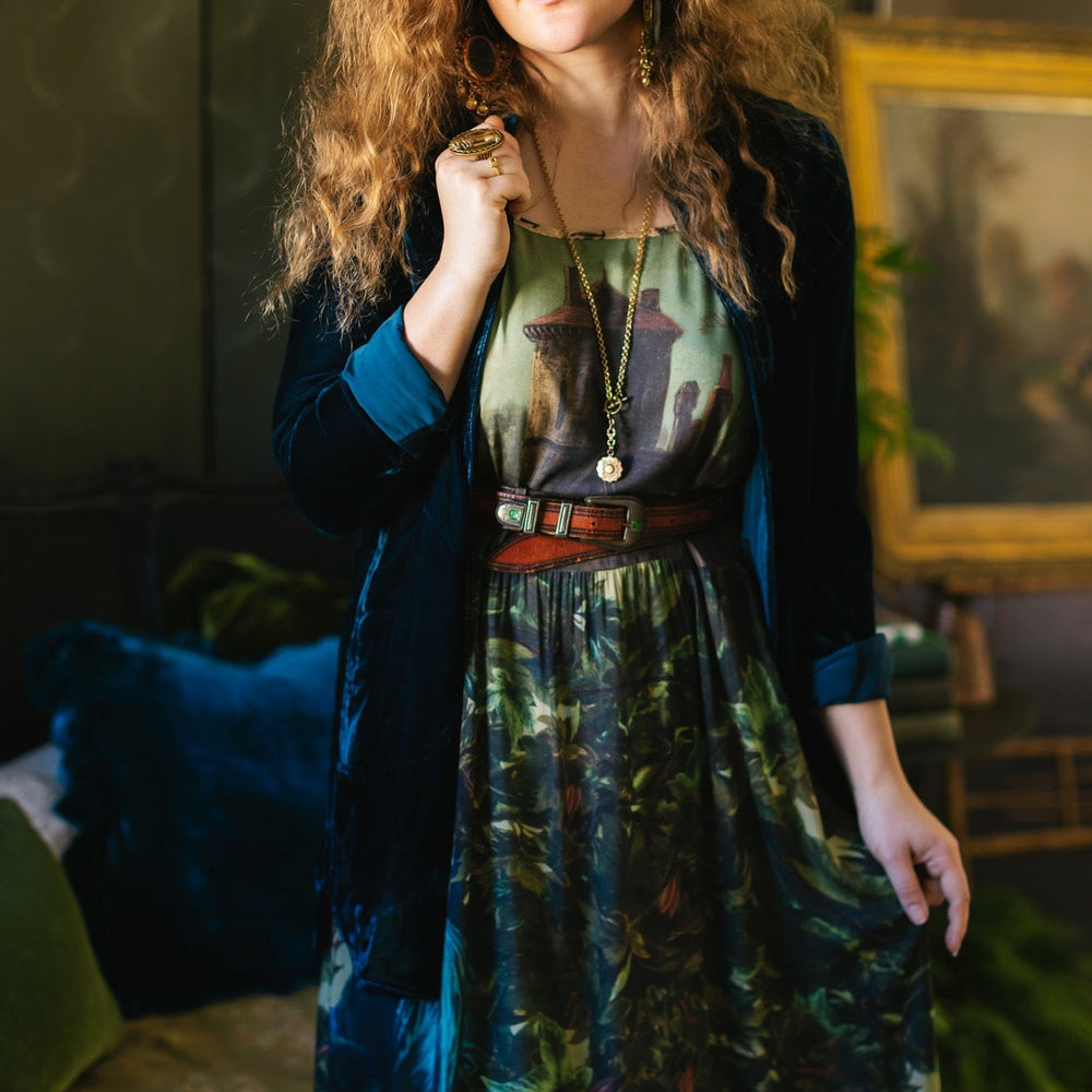 
                  
                    A romantic bamboo-based viscose slip dress featuring a moonlit river scene, a seated woman painted by Dante Gabriel Rossetti, and a hidden quote from a 1700s ring – Market of
                  
                