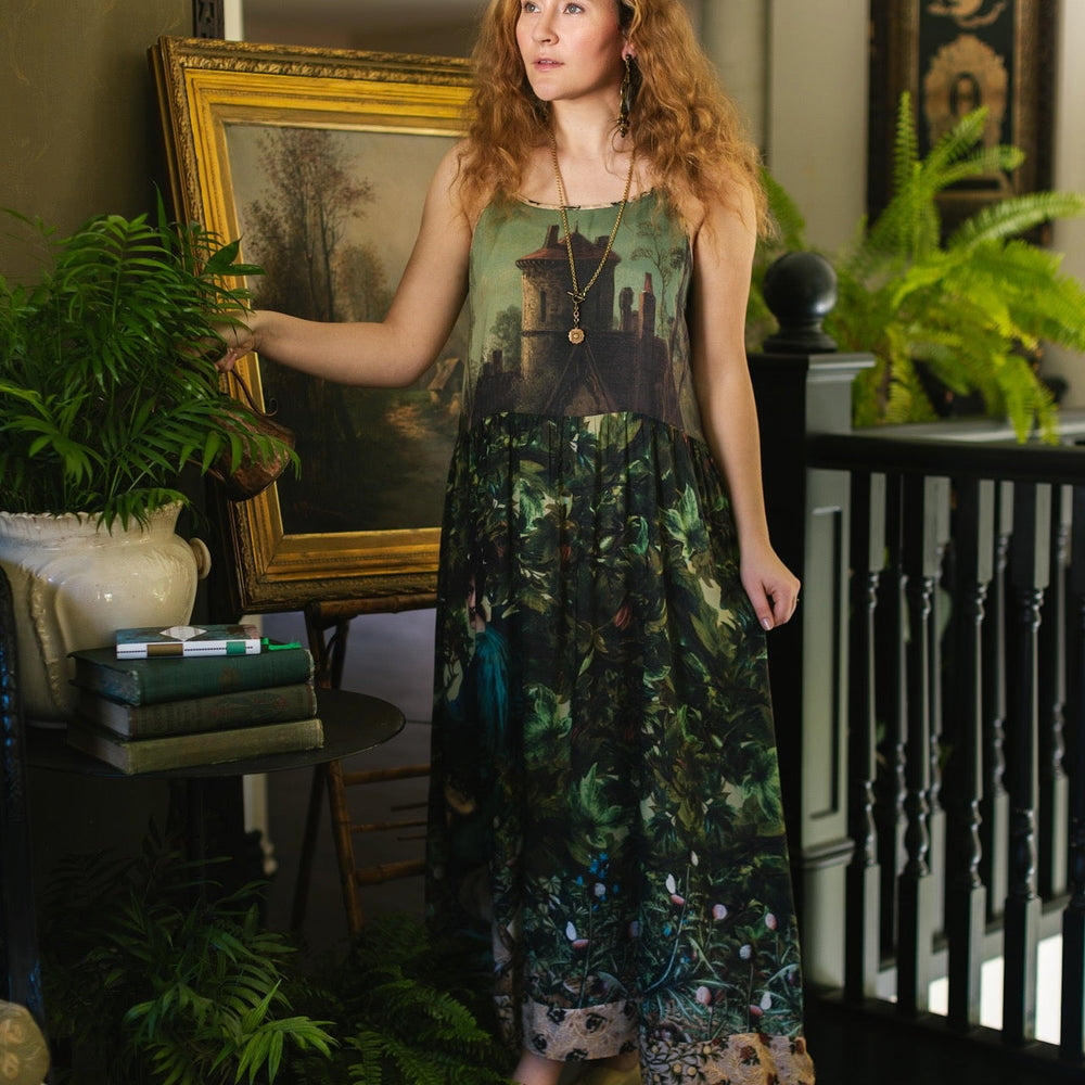 
                  
                    A romantic bamboo-based viscose slip dress featuring a moonlit river scene, a seated woman painted by Dante Gabriel Rossetti, and a hidden quote from a 1700s ring – Market of
                  
                