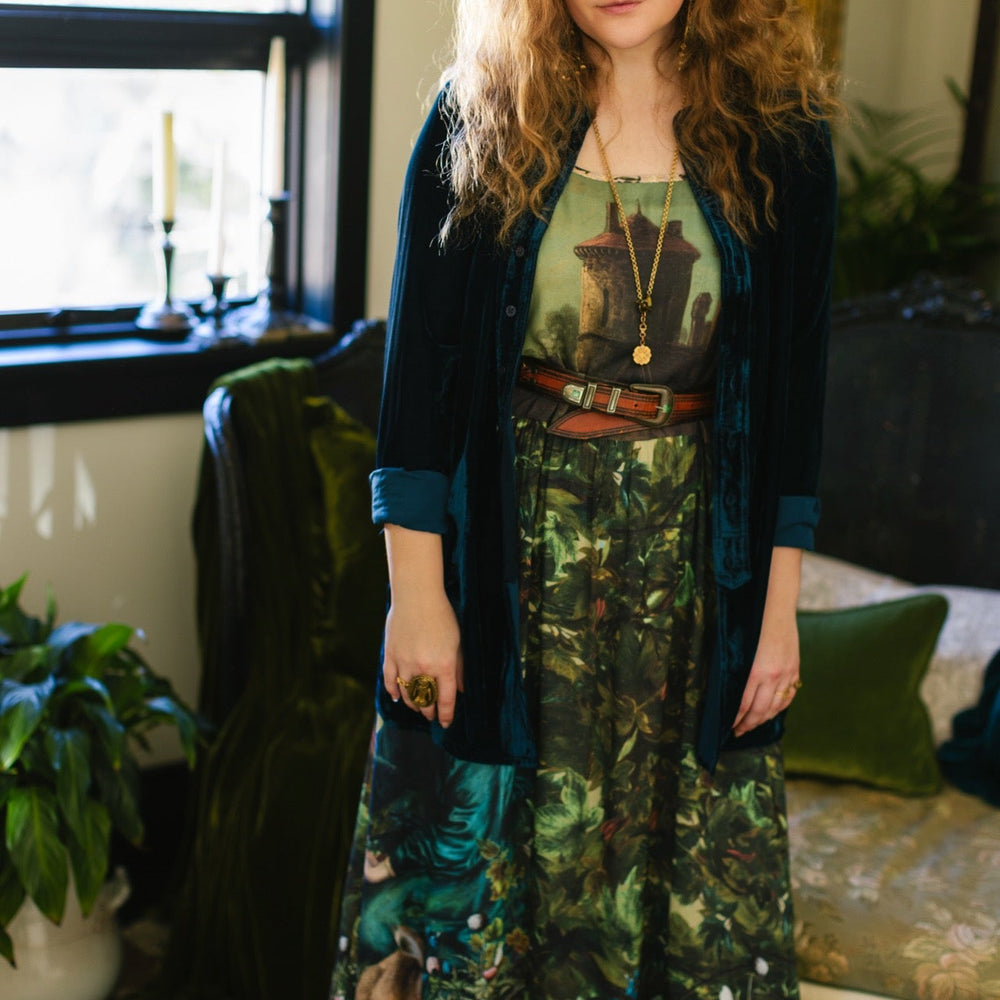 
                  
                    A romantic bamboo-based viscose slip dress featuring a moonlit river scene, a seated woman painted by Dante Gabriel Rossetti, and a hidden quote from a 1700s ring – Market of
                  
                