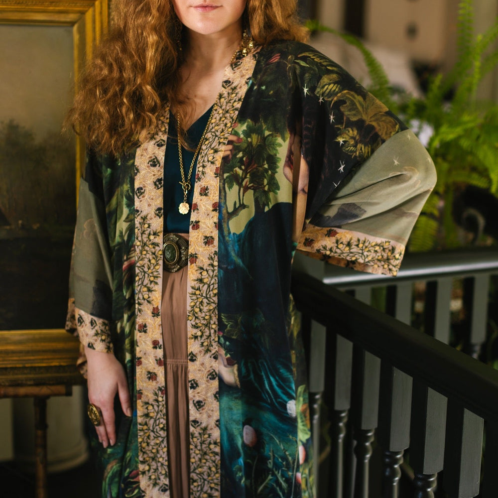
                  
                    Romantic Bella Notte opera duster featuring Rossetti’s muse, a 16th-century rabbit, moonlit landscapes, and floral trim by William Morris – Market of Stars.
                  
                