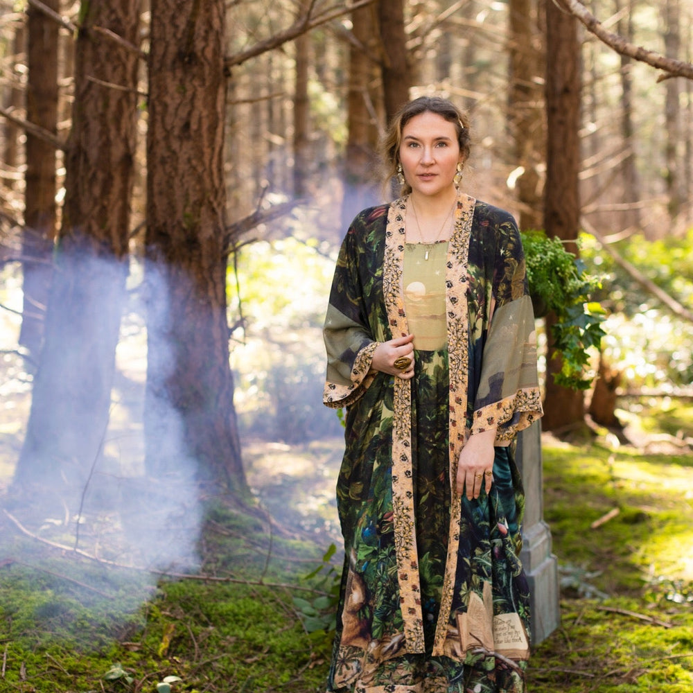 
                  
                    Romantic Bella Notte opera duster featuring Rossetti’s muse, a 16th-century rabbit, moonlit landscapes, and floral trim by William Morris – Market of Stars.
                  
                