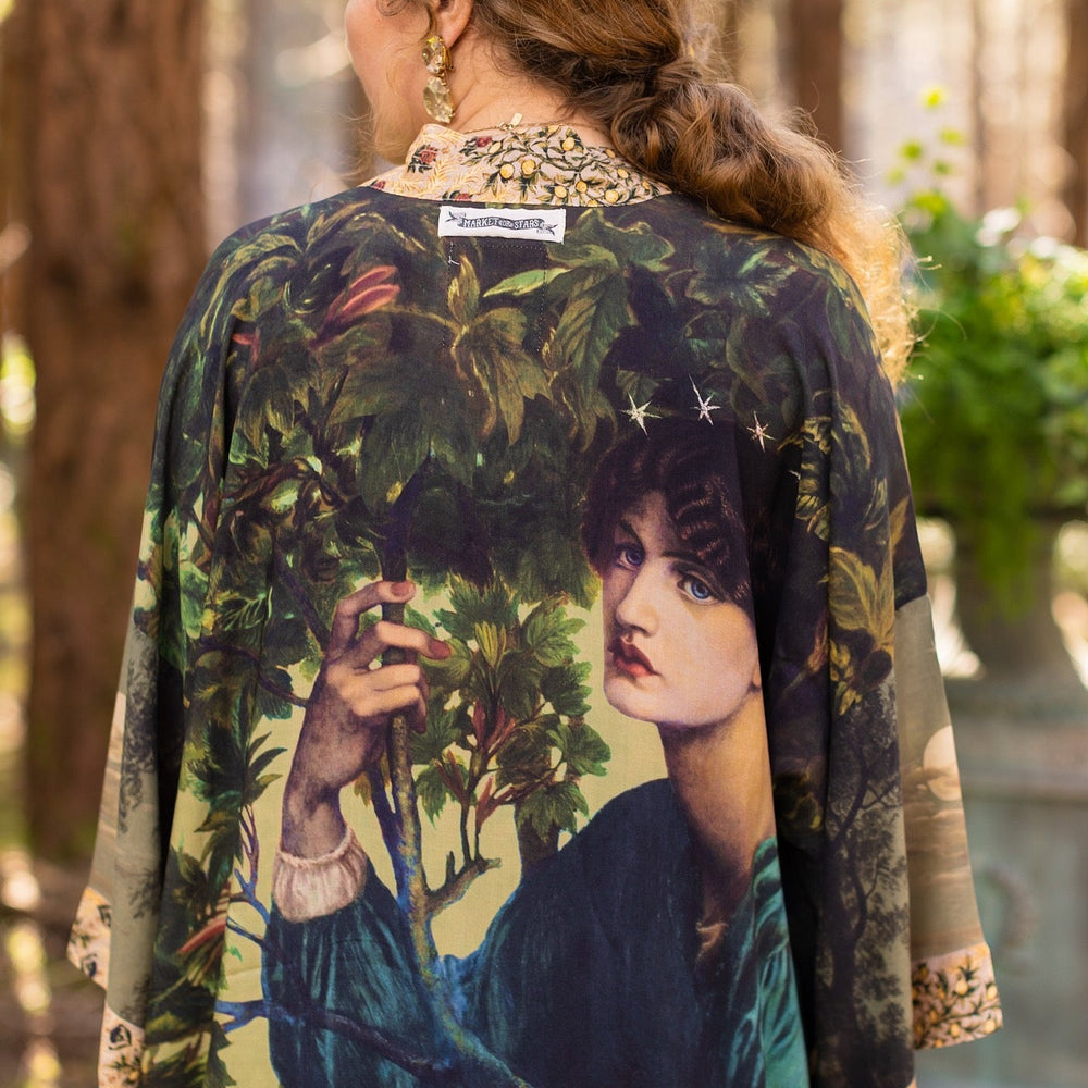 
                  
                    Romantic Bella Notte opera duster featuring Rossetti’s muse, a 16th-century rabbit, moonlit landscapes, and floral trim by William Morris – Market of Stars.
                  
                