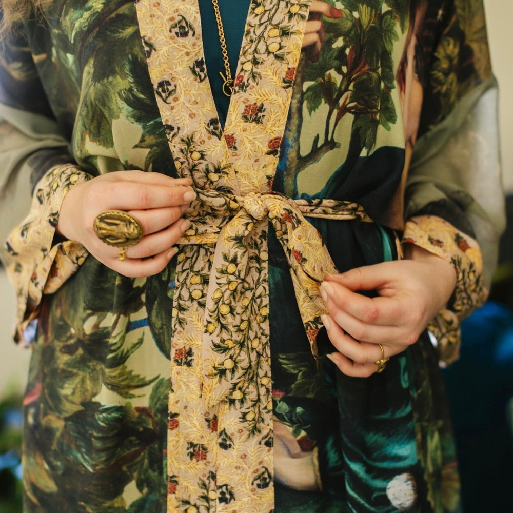 
                  
                    Romantic Bella Notte opera duster featuring Rossetti’s muse, a 16th-century rabbit, moonlit landscapes, and floral trim by William Morris – Market of Stars.
                  
                
