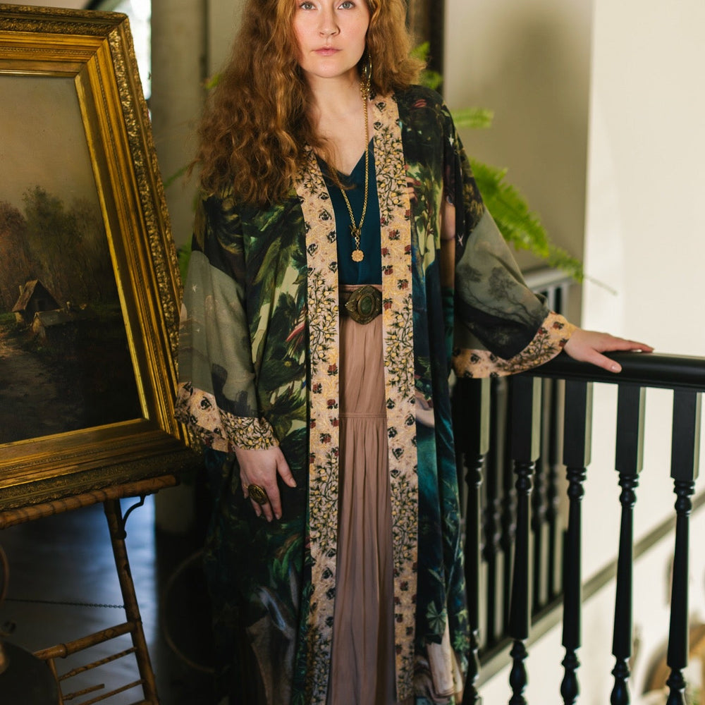 
                  
                    Romantic Bella Notte opera duster featuring Rossetti’s muse, a 16th-century rabbit, moonlit landscapes, and floral trim by William Morris – Market of Stars.
                  
                