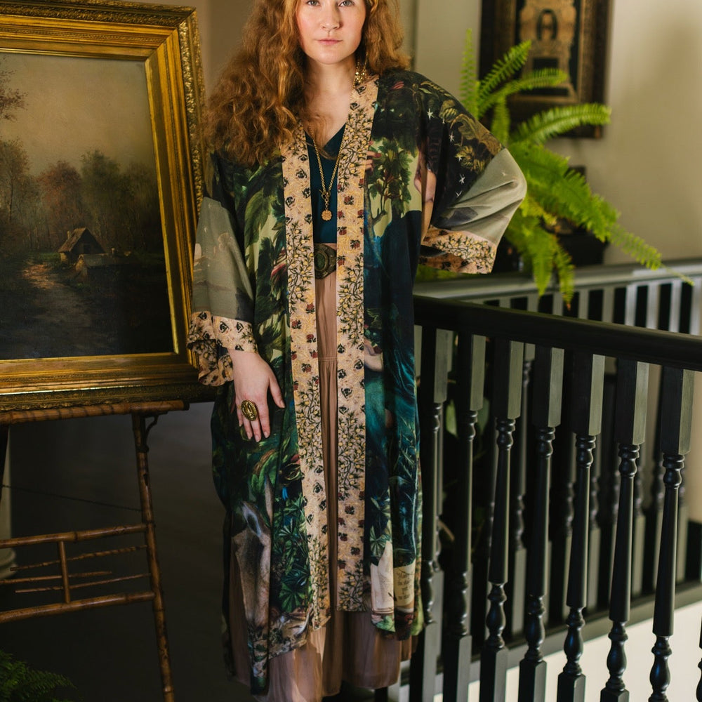 
                  
                    Romantic Bella Notte opera duster featuring Rossetti’s muse, a 16th-century rabbit, moonlit landscapes, and floral trim by William Morris – Market of Stars.
                  
                