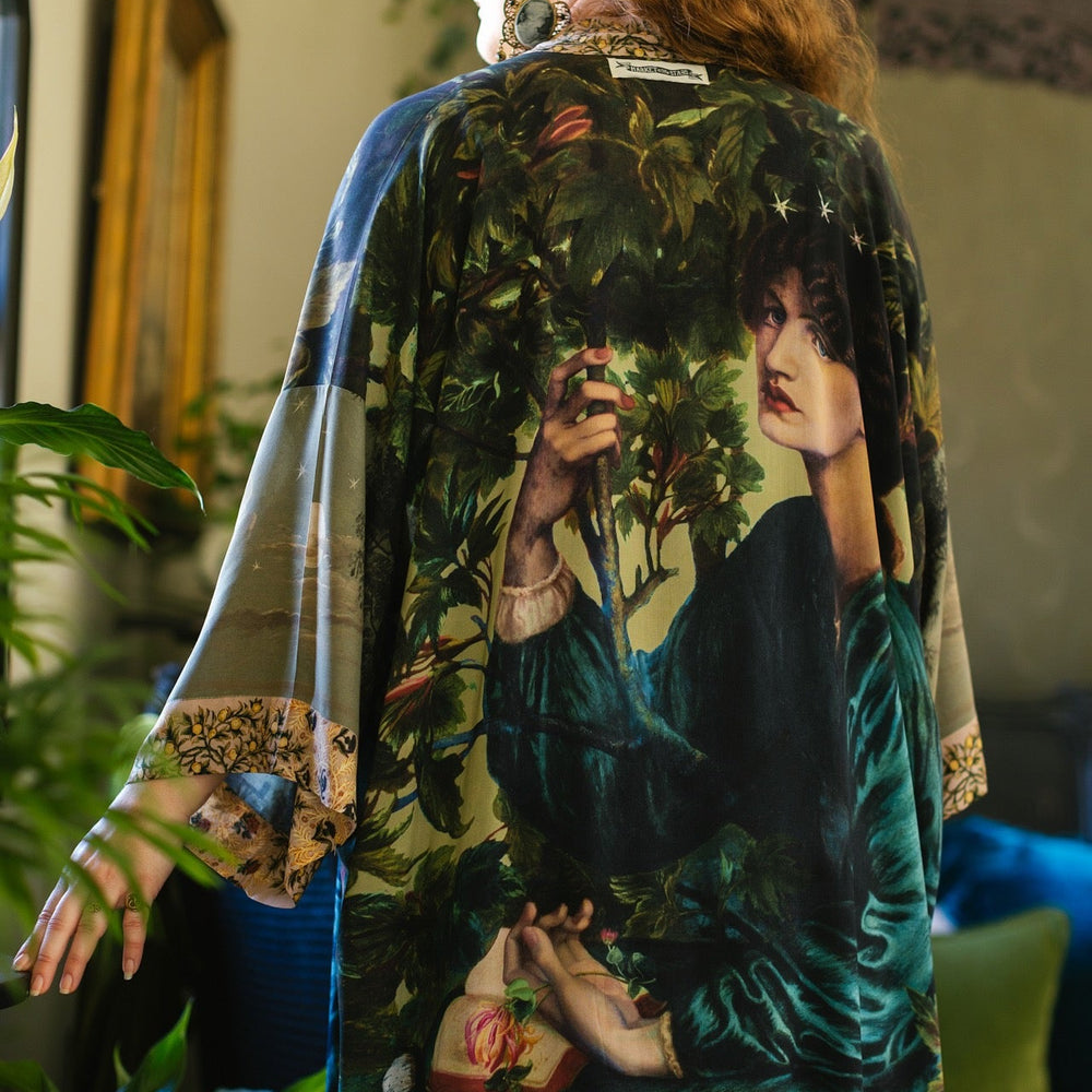 
                  
                    Romantic Bella Notte opera duster featuring Rossetti’s muse, a 16th-century rabbit, moonlit landscapes, and floral trim by William Morris – Market of Stars.
                  
                