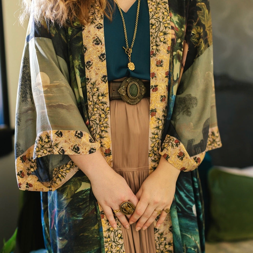 
                  
                    Romantic Bella Notte opera duster featuring Rossetti’s muse, a 16th-century rabbit, moonlit landscapes, and floral trim by William Morris – Market of Stars.
                  
                
