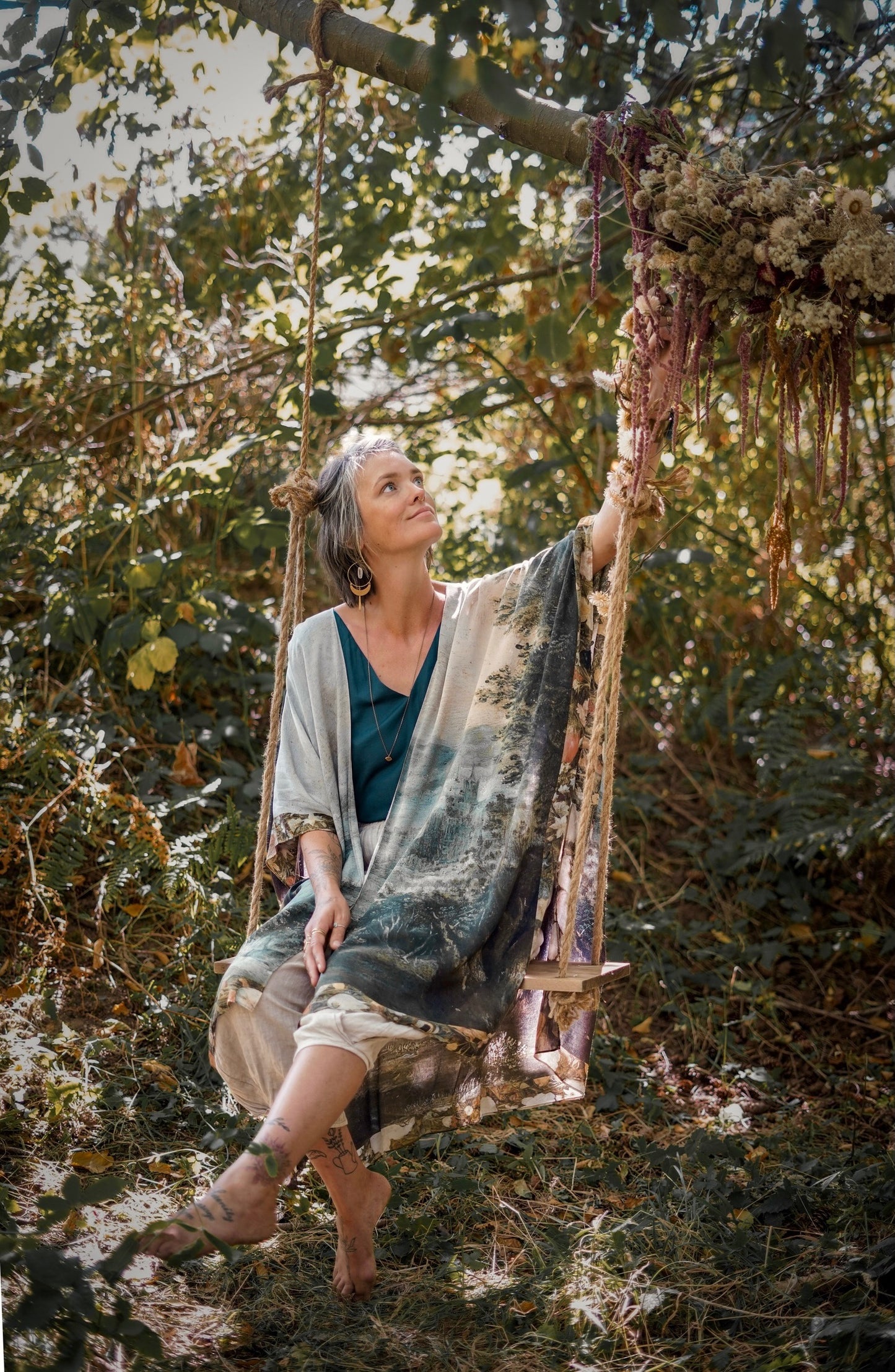 Castles in the Air Starduster kimono featuring Brueghel’s 1600s landscape, classical ruins, and joyful swing scene on bamboo-based viscose – Market of Stars.