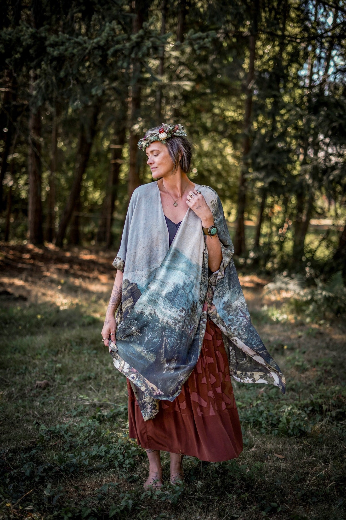 Castles in the Air Starduster kimono featuring Brueghel’s 1600s landscape, classical ruins, and joyful swing scene on bamboo-based viscose – Market of Stars.