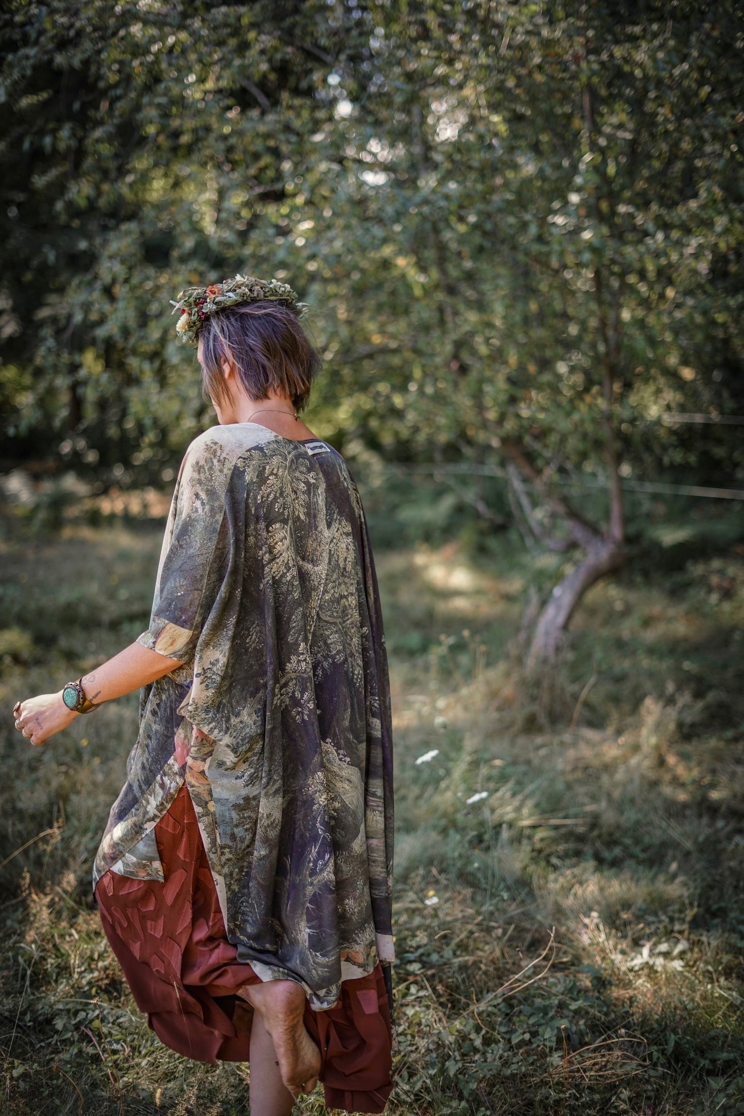 Castles in the Air Starduster kimono featuring Brueghel’s 1600s landscape, classical ruins, and joyful swing scene on bamboo-based viscose – Market of Stars.
