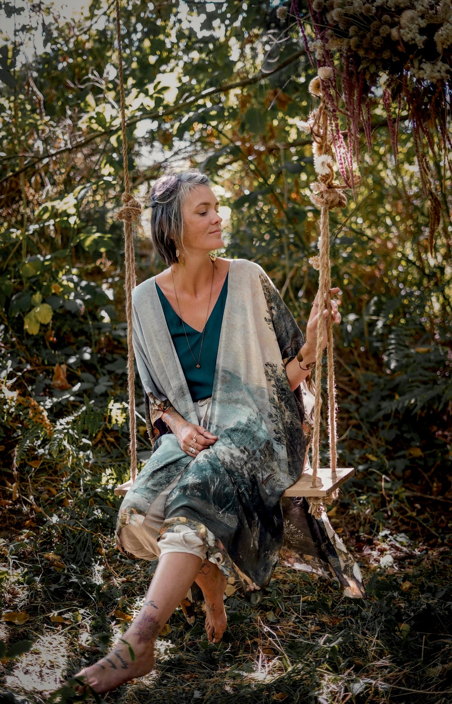 Castles in the Air Starduster kimono featuring Brueghel’s 1600s landscape, classical ruins, and joyful swing scene on bamboo-based viscose – Market of Stars.