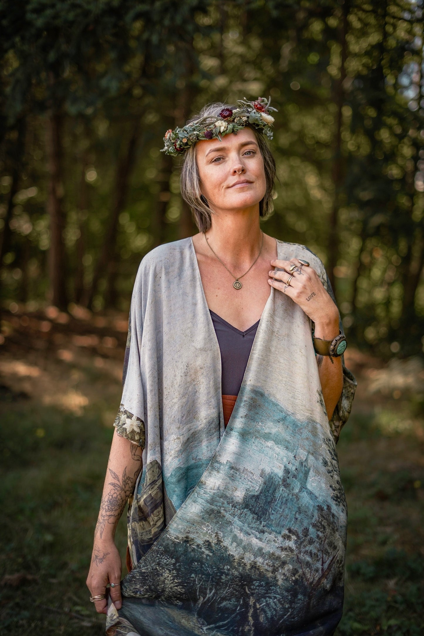 Castles in the Air Starduster kimono featuring Brueghel’s 1600s landscape, classical ruins, and joyful swing scene on bamboo-based viscose – Market of Stars.