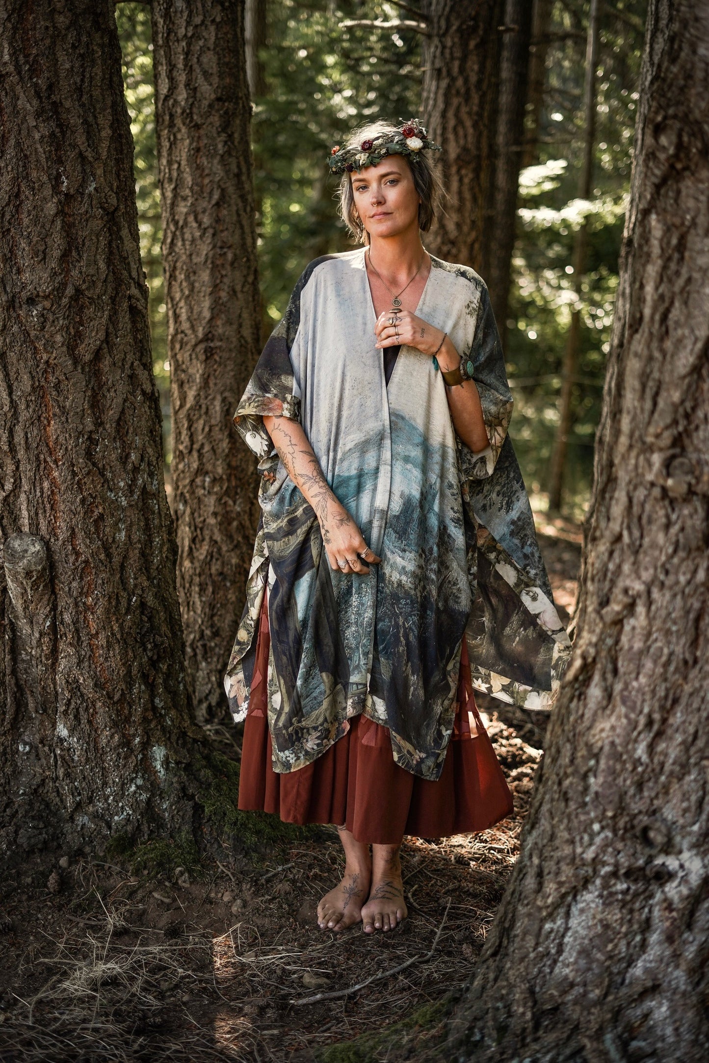 Castles in the Air Starduster kimono featuring Brueghel’s 1600s landscape, classical ruins, and joyful swing scene on bamboo-based viscose – Market of Stars.