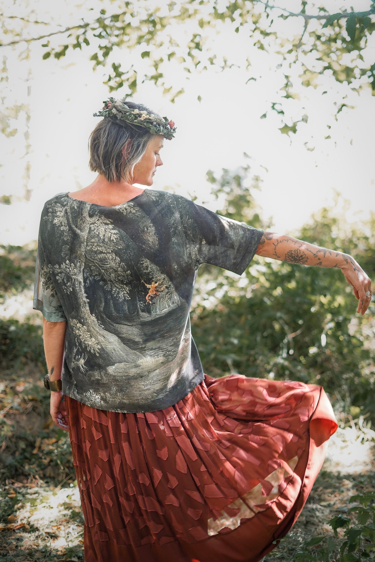 Castles in the Air Luxe Tee featuring Jan Brueghel’s whimsical 1600s landscape and painterly floral trim on soft bamboo-based viscose – Market of Stars.