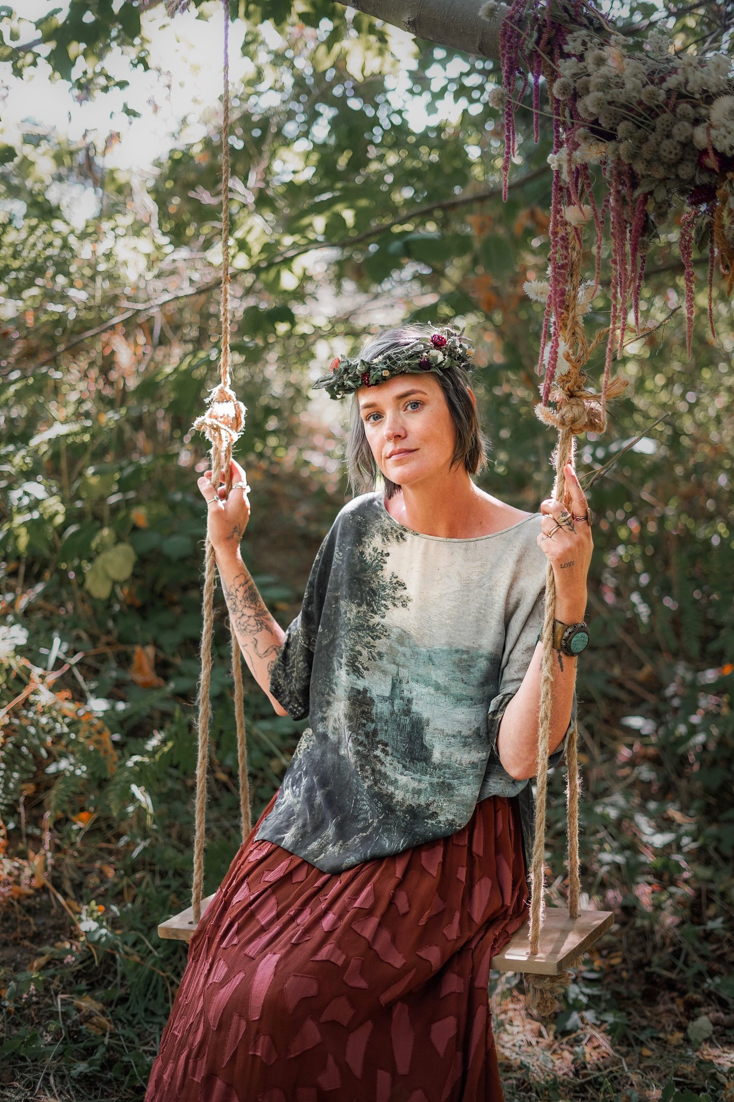 Castles in the Air Luxe Tee featuring Jan Brueghel’s whimsical 1600s landscape and painterly floral trim on soft bamboo-based viscose – Market of Stars.