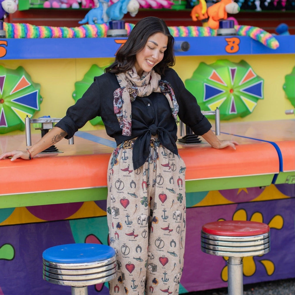 
                  
                    Charmed Life Scarf featuring whimsical Victorian good luck symbols and floral trim on soft, airy bamboo & wood viscose fabric – Market of Stars.
                  
                