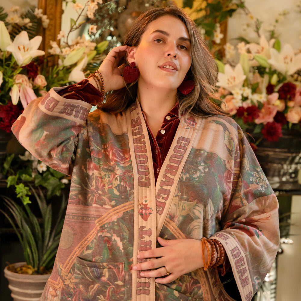 
                  
                    Cozy Courage Dear Heart Cottage Jacket featuring Victorian Sacred Heart art, hidden affirmations of courage and love, and soft fleece lining for cooler days – Market of Stars.
                  
                
