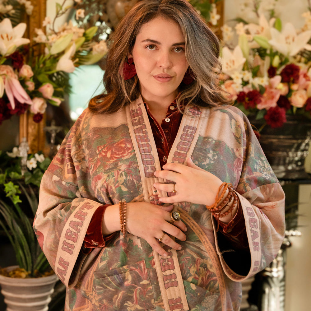 
                  
                    Cozy Courage Dear Heart Cottage Jacket featuring Victorian Sacred Heart art, hidden affirmations of courage and love, and soft fleece lining for cooler days – Market of Stars.
                  
                