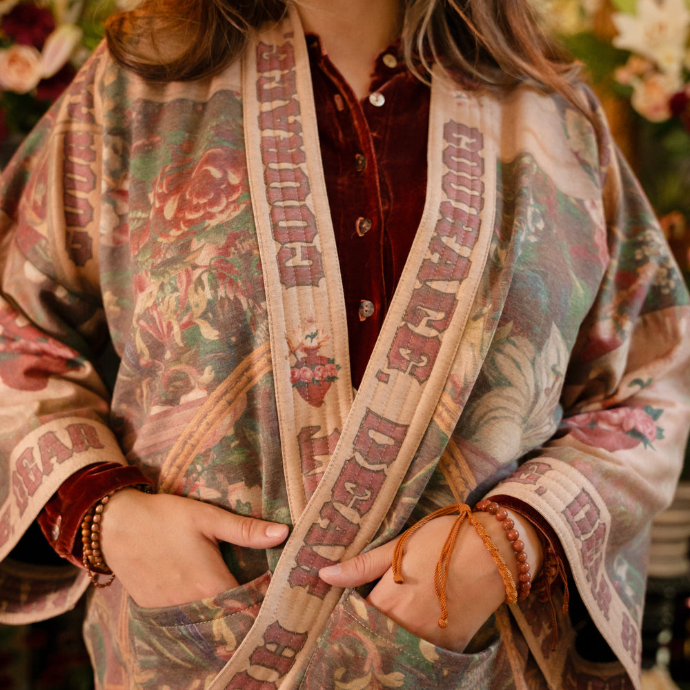 
                  
                    Cozy Courage Dear Heart Cottage Jacket featuring Victorian Sacred Heart art, hidden affirmations of courage and love, and soft fleece lining for cooler days – Market of Stars.
                  
                