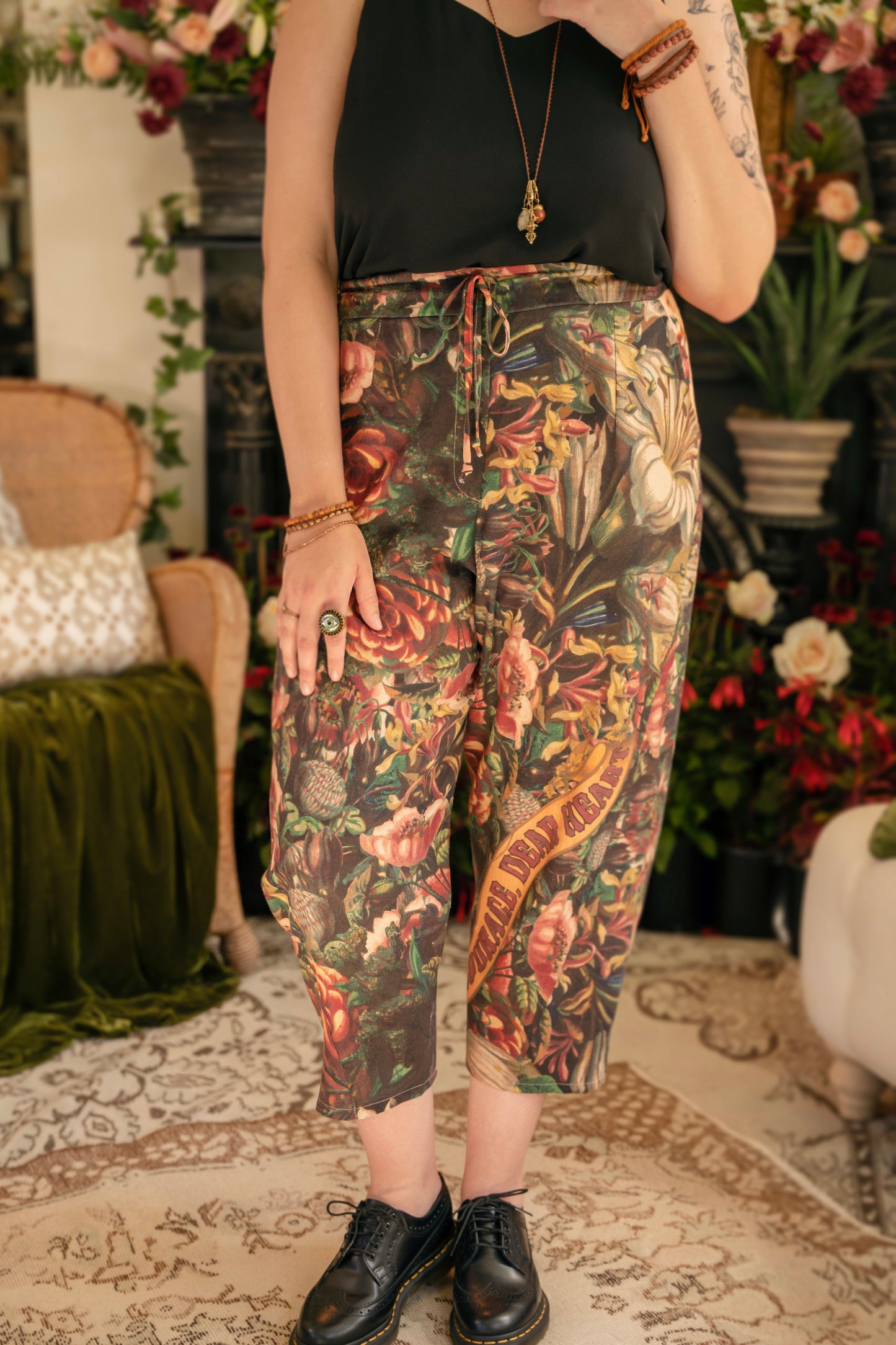 Artfully printed Courage Dear Heart Artist Pants with floral lithographs and hidden messages of love, faith, and courage in a breathable linen blend – Market of Stars.