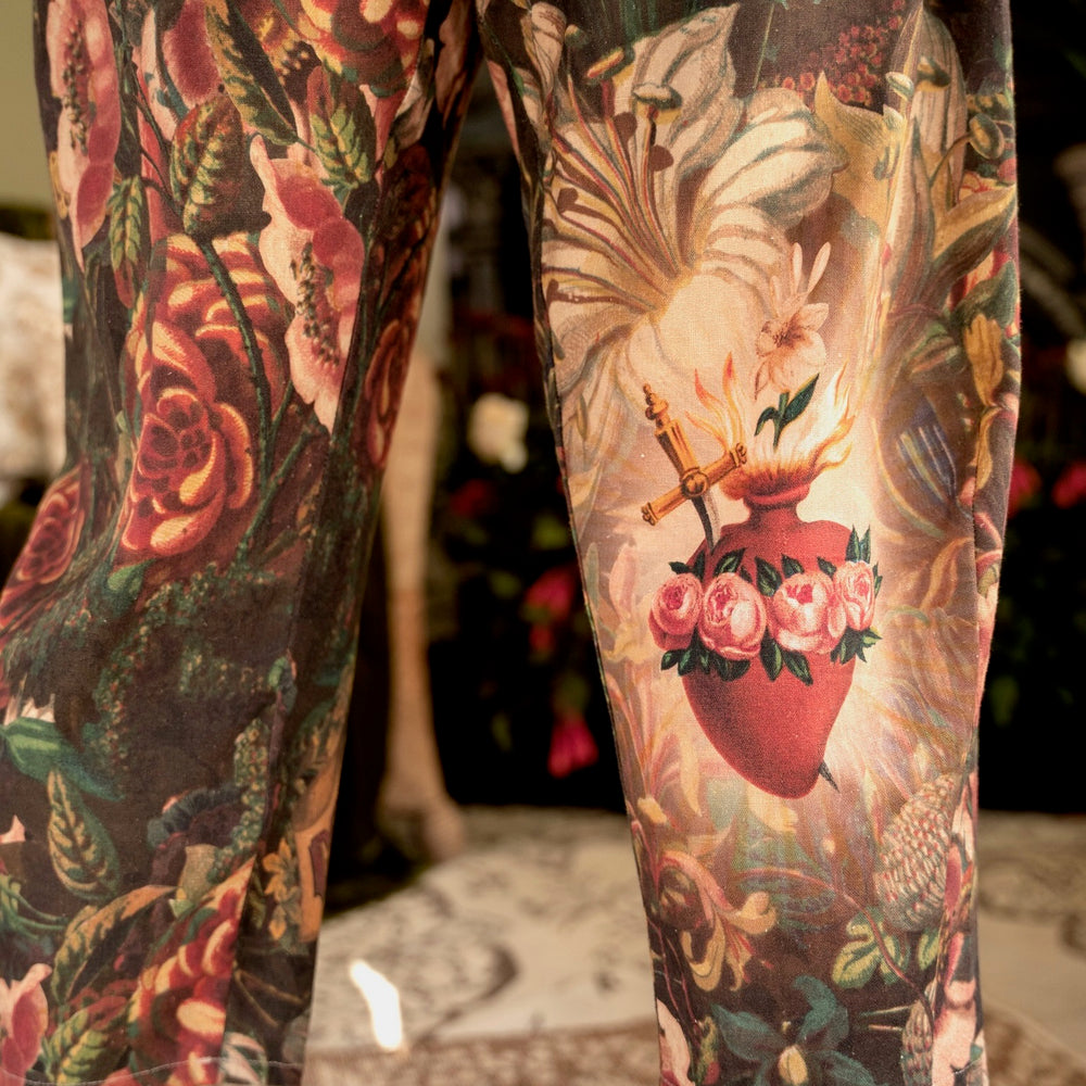 
                  
                    Artfully printed Courage Dear Heart Artist Pants with floral lithographs and hidden messages of love, faith, and courage in a breathable linen blend – Market of Stars.
                  
                