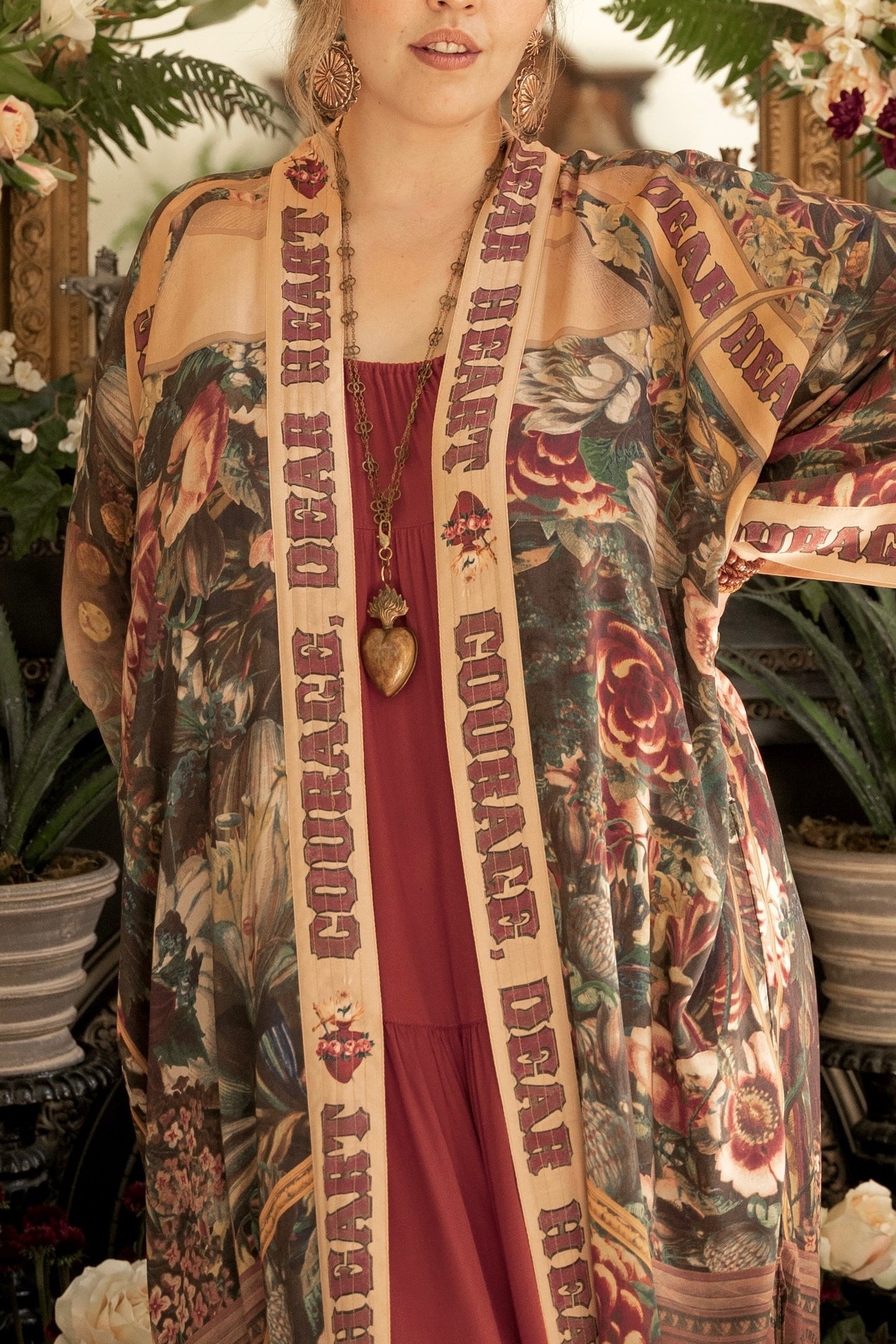 Model wearing Take Heart Opera Duster featuring Victorian Sacred Heart art, hidden affirmations of love, courage, and strength on bamboo-based viscose – Market of Stars