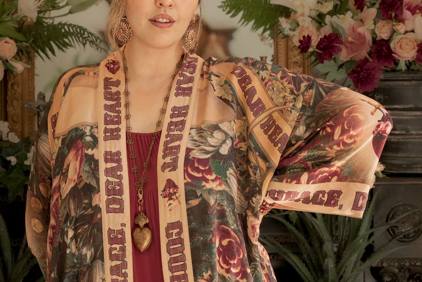 Model wearing Take Heart Opera Duster featuring Victorian Sacred Heart art, hidden affirmations of love, courage, and strength on bamboo-based viscose – Market of Stars