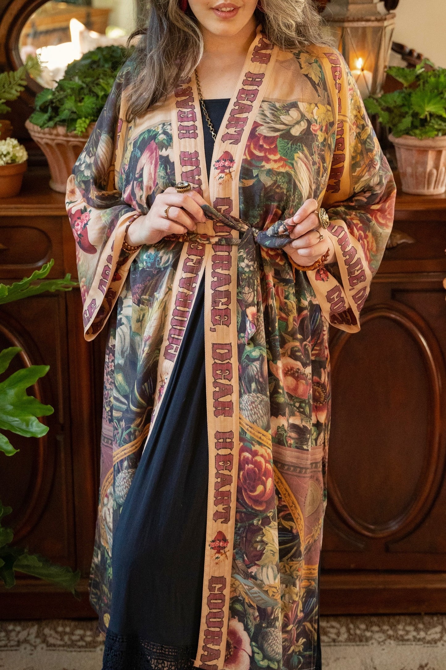 Model wearing Take Heart Opera Duster featuring Victorian Sacred Heart art, hidden affirmations of love, courage, and strength on bamboo-based viscose – Market of Stars