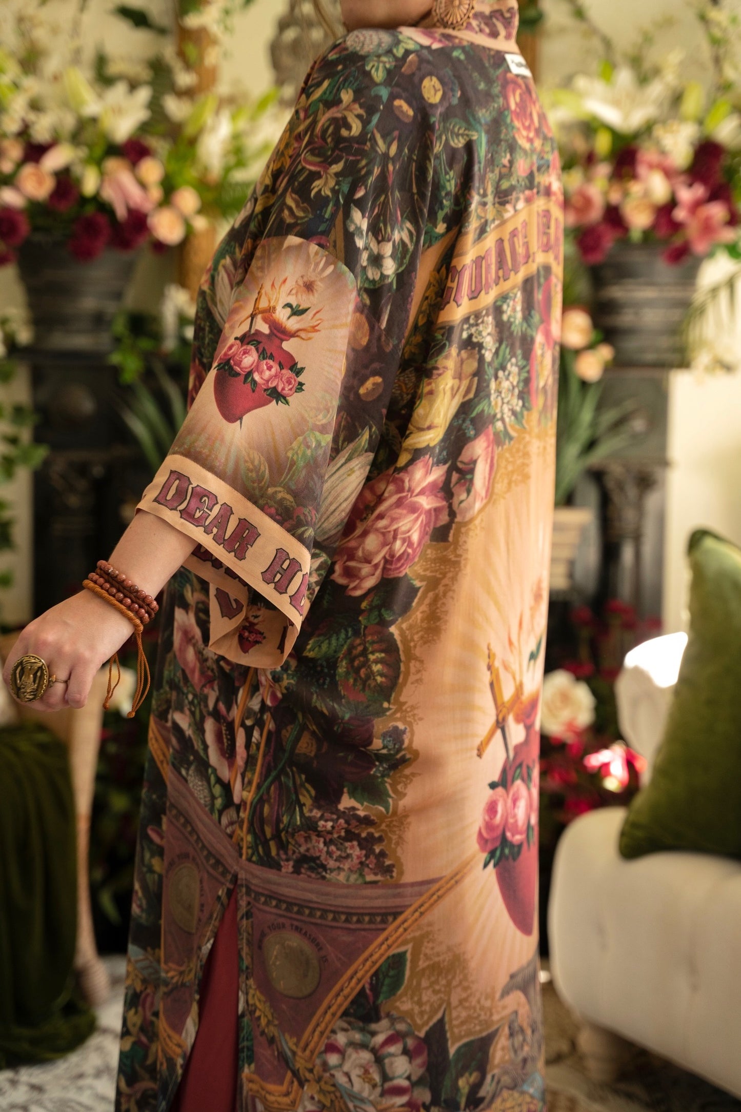 Model wearing Take Heart Opera Duster featuring Victorian Sacred Heart art, hidden affirmations of love, courage, and strength on bamboo-based viscose – Market of Stars