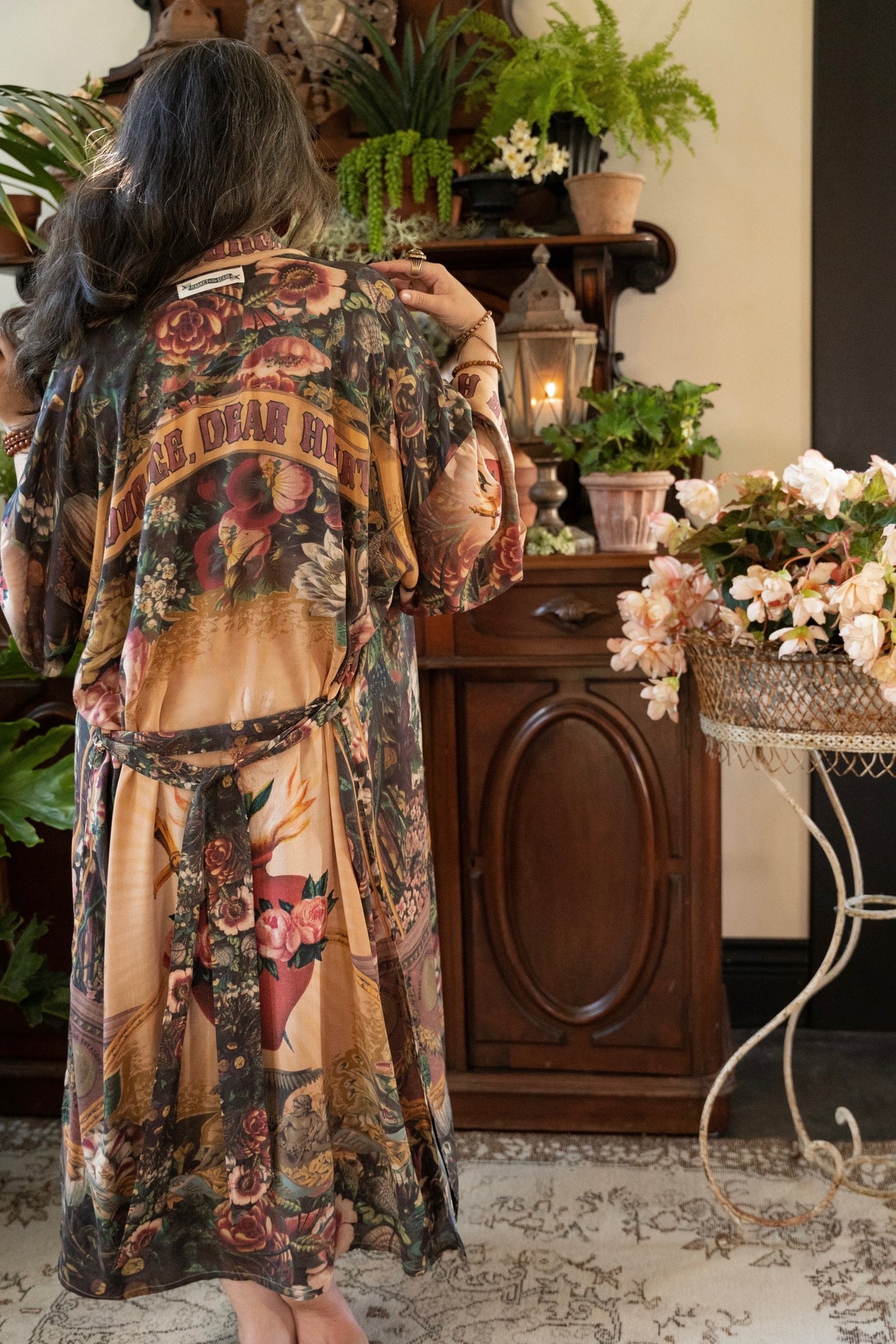 Model wearing Take Heart Opera Duster featuring Victorian Sacred Heart art, hidden affirmations of love, courage, and strength on bamboo-based viscose – Market of Stars
