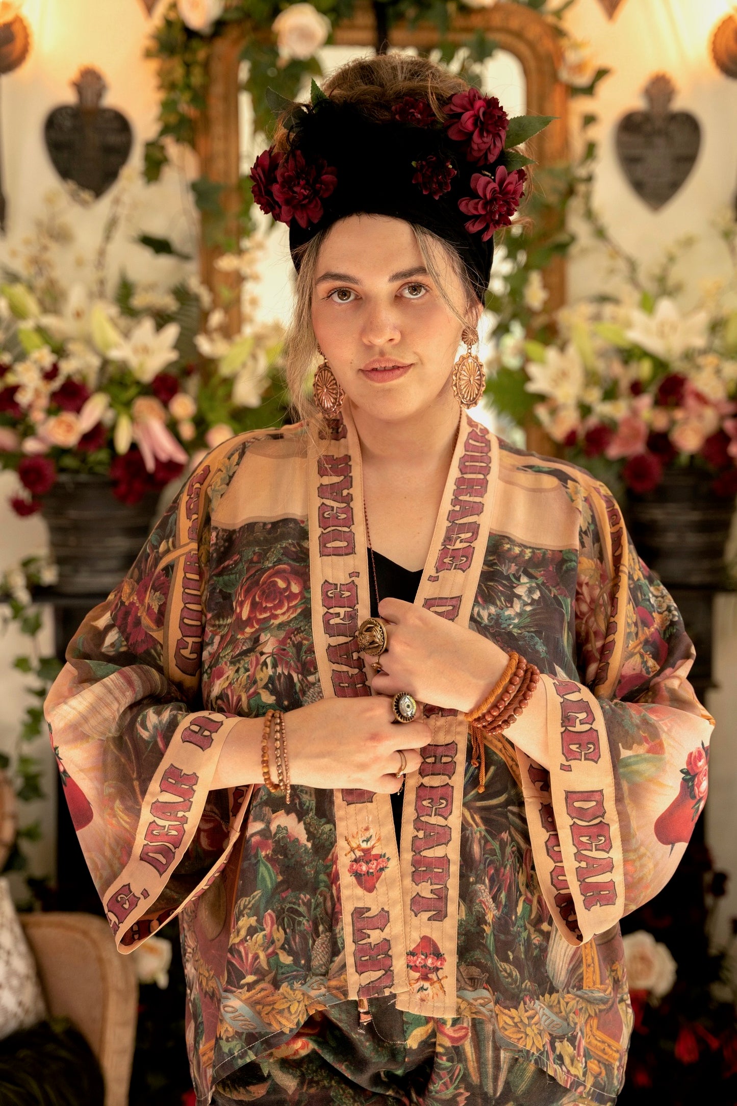 Model wearing Courage Dear Heart Pixie cut Duster featuring Victorian Sacred Heart art and hidden affirmations of courage and love on bamboo-based viscose – Market of Stars.