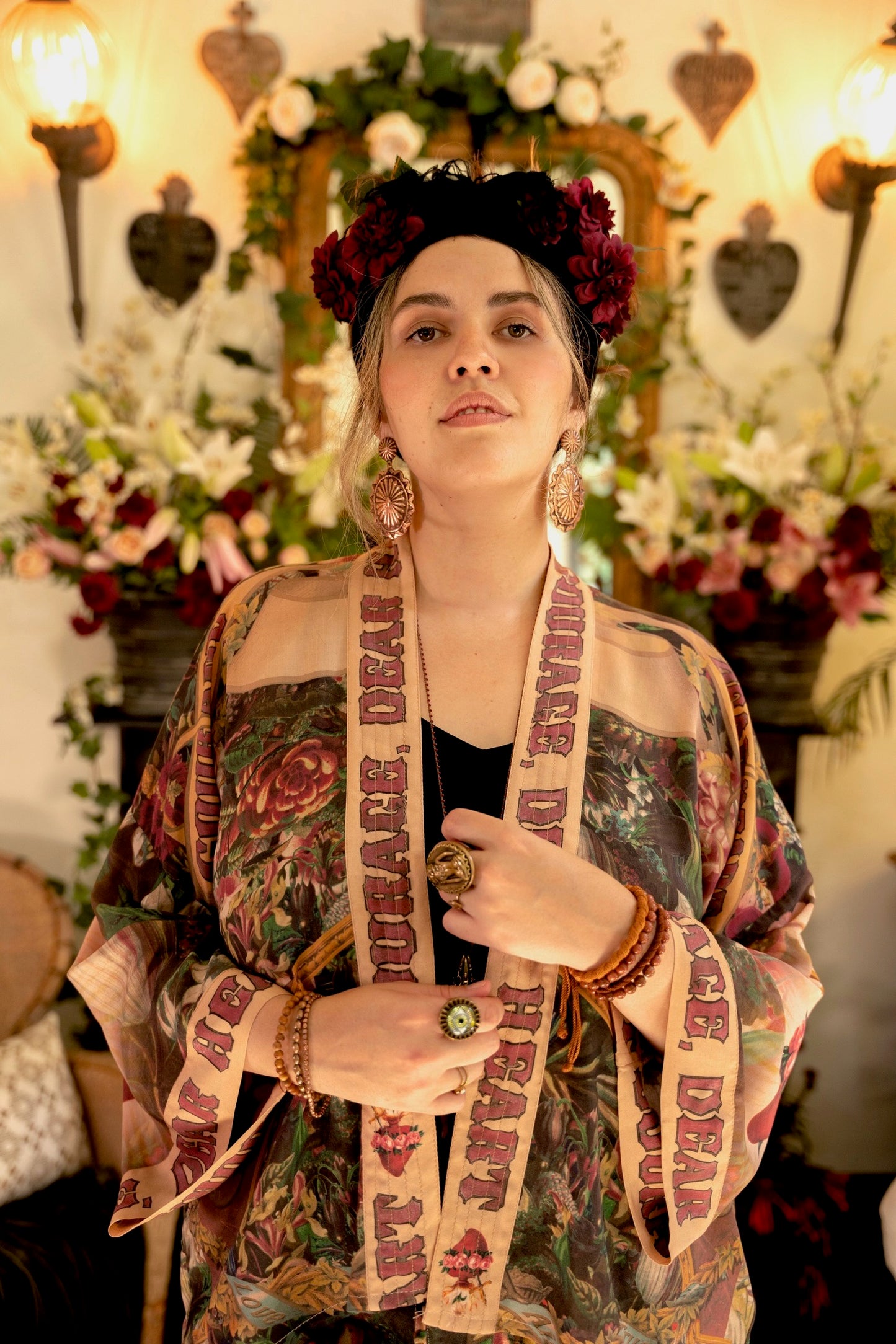 Model wearing Courage Dear Heart Pixie cut Duster featuring Victorian Sacred Heart art and hidden affirmations of courage and love on bamboo-based viscose – Market of Stars.