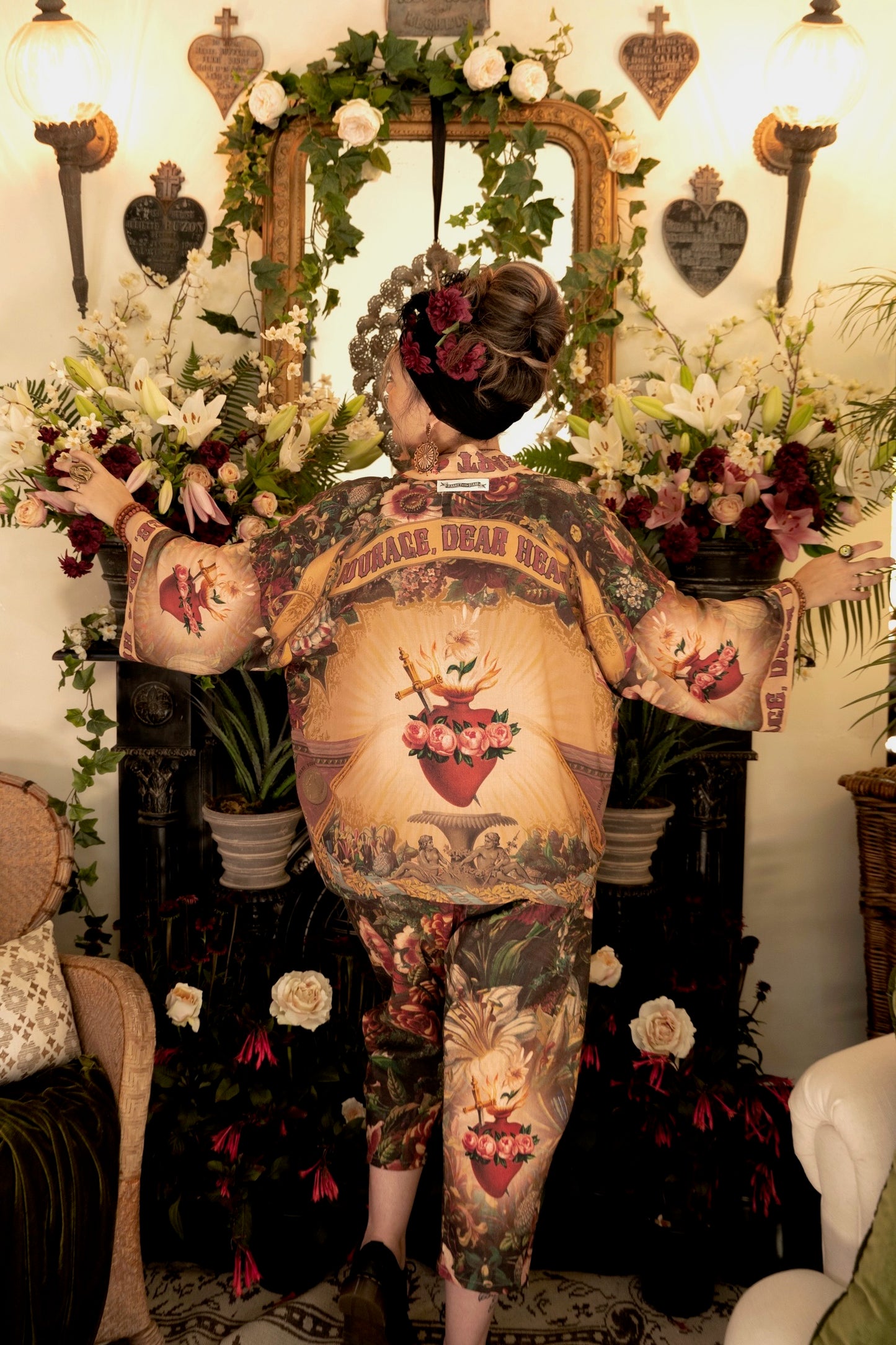 Model wearing Courage Dear Heart Pixie cut Duster featuring Victorian Sacred Heart art and hidden affirmations of courage and love on bamboo-based viscose – Market of Stars.