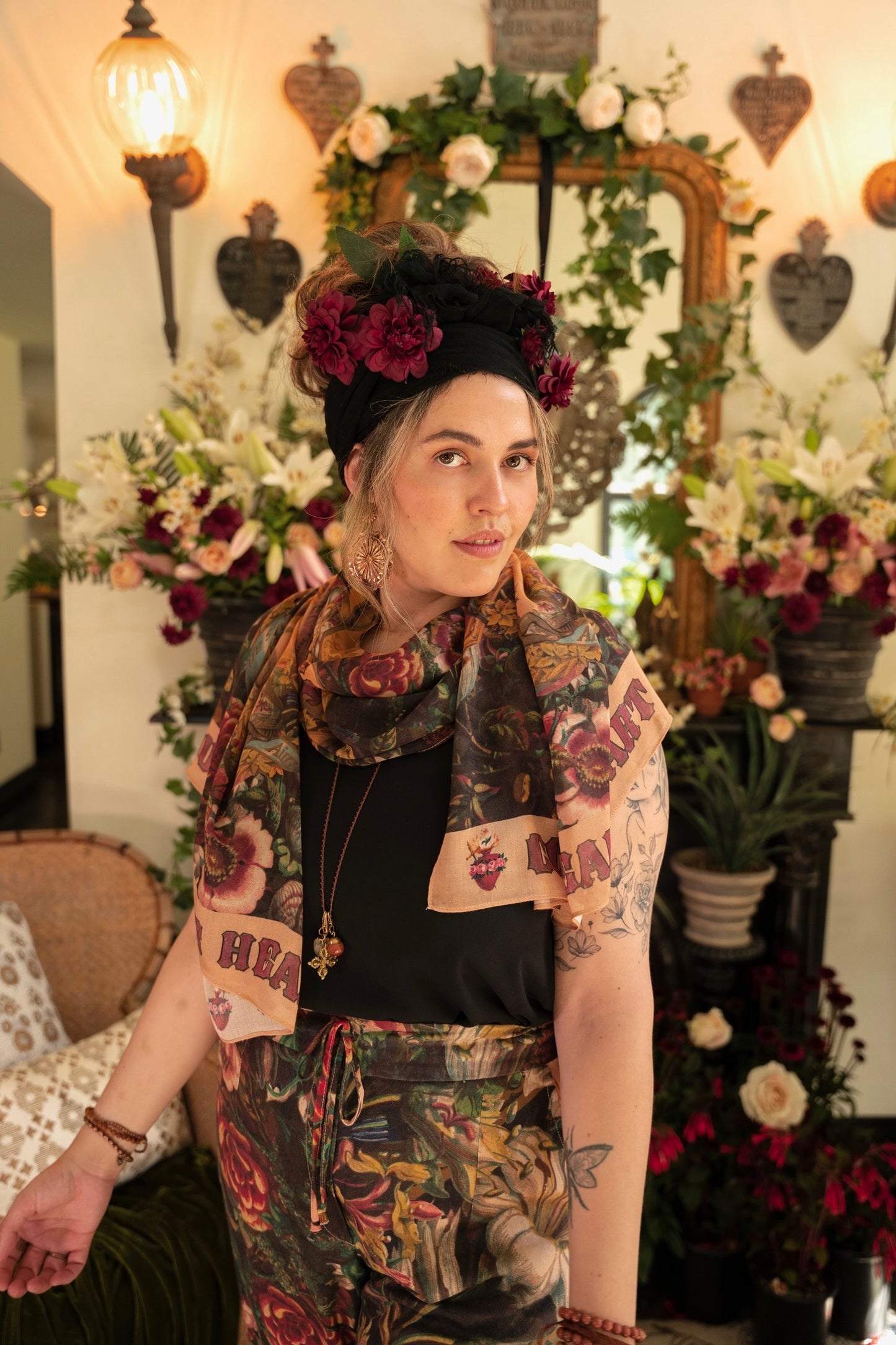 Model wearing Courage Dear Heart scarf featuring Victorian lithographs, Sacred Heart art, and hidden messages of love, faith, and courage on soft bamboo viscose – Market of Stars