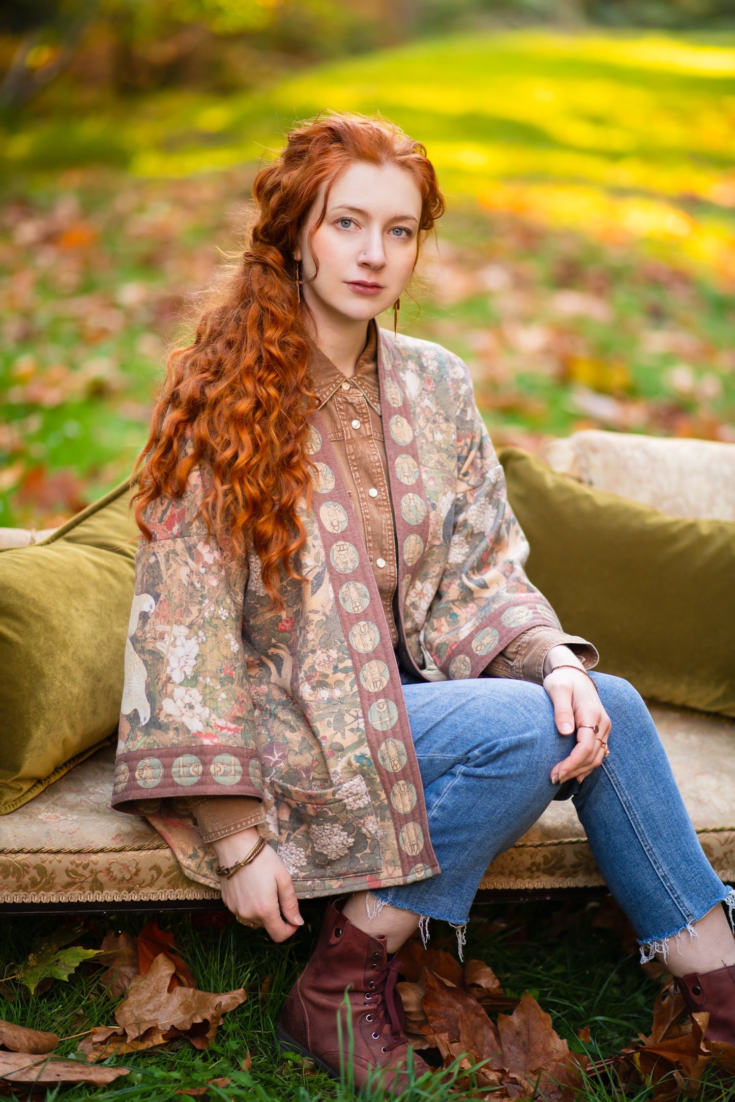 Model wearing Dreamweaver Cottage Cardigan featuring Mucha’s 1896 zodiac woman with celestial crown, printed on cozy fleece-lined cotton blend – Market of Stars