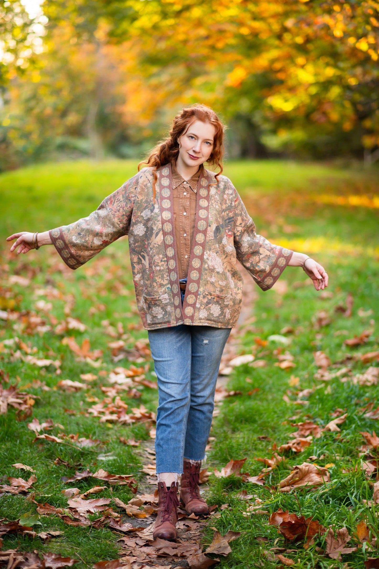 Model wearing Dreamweaver Cottage Cardigan featuring Mucha’s 1896 zodiac woman with celestial crown, printed on cozy fleece-lined cotton blend – Market of Stars