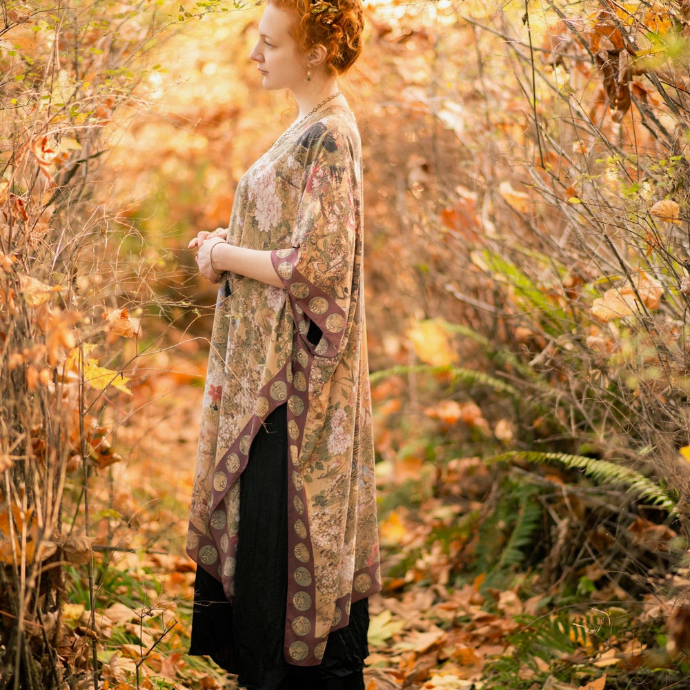 
                  
                    Dreamweaver Goddess Duster featuring Alphonse Mucha’s 1896 zodiac woman, celestial crown, and burgundy zodiac trim inspired by vintage bohemian style – Market of Stars
                  
                
