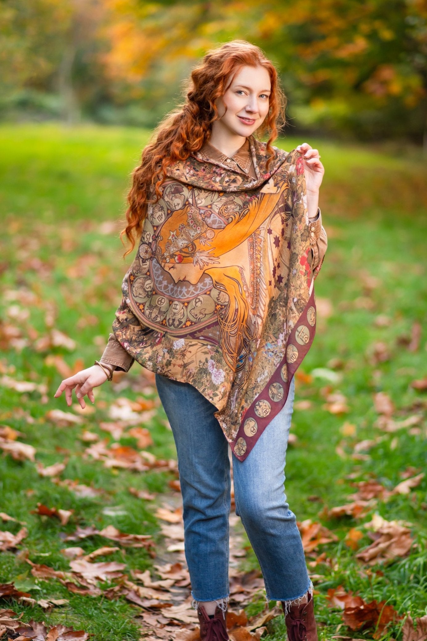 Model wearing Dreamweaver Zodiac Scarf – featuring Alphonse Mucha’s 1896 celestial woman surrounded by zodiac signs and floral scroll artwork – Market of Stars.