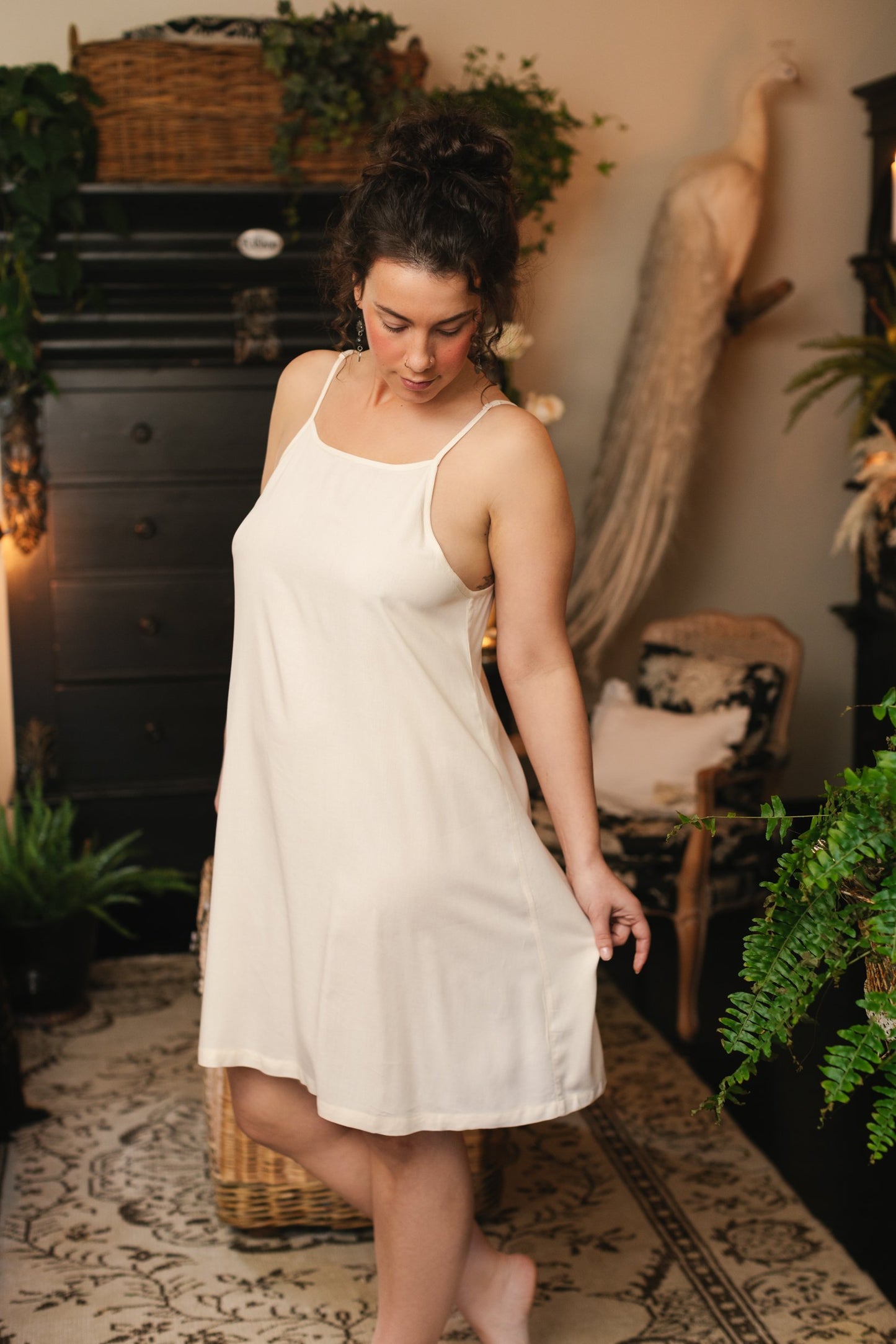 Model wearing the Étoile Simple Slip in soft natural viscose – perfect for layering under Market of Stars dresses, adding comfort and coverage – Market of Stars.