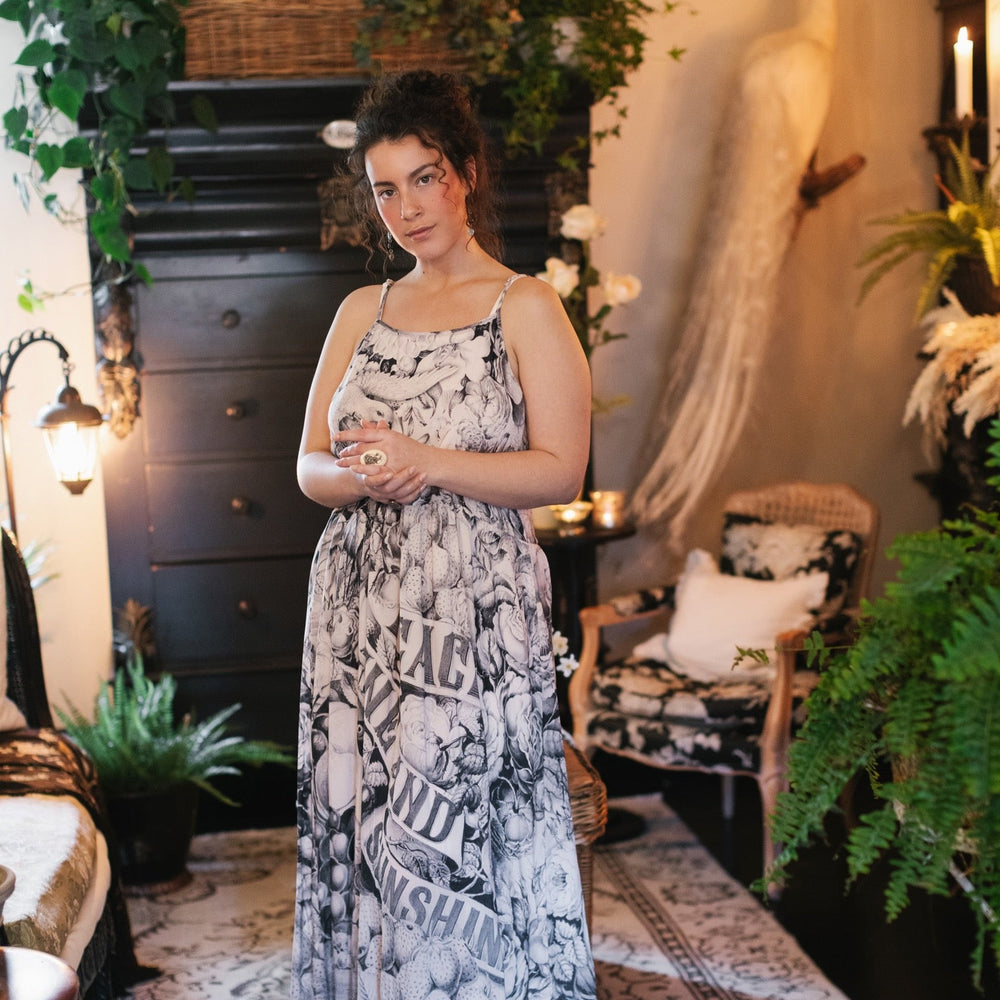 
                  
                    Model wearing the Étoile Simple Slip in soft natural viscose – perfect for layering under Market of Stars dresses, adding comfort and coverage – Market of Stars.
                  
                