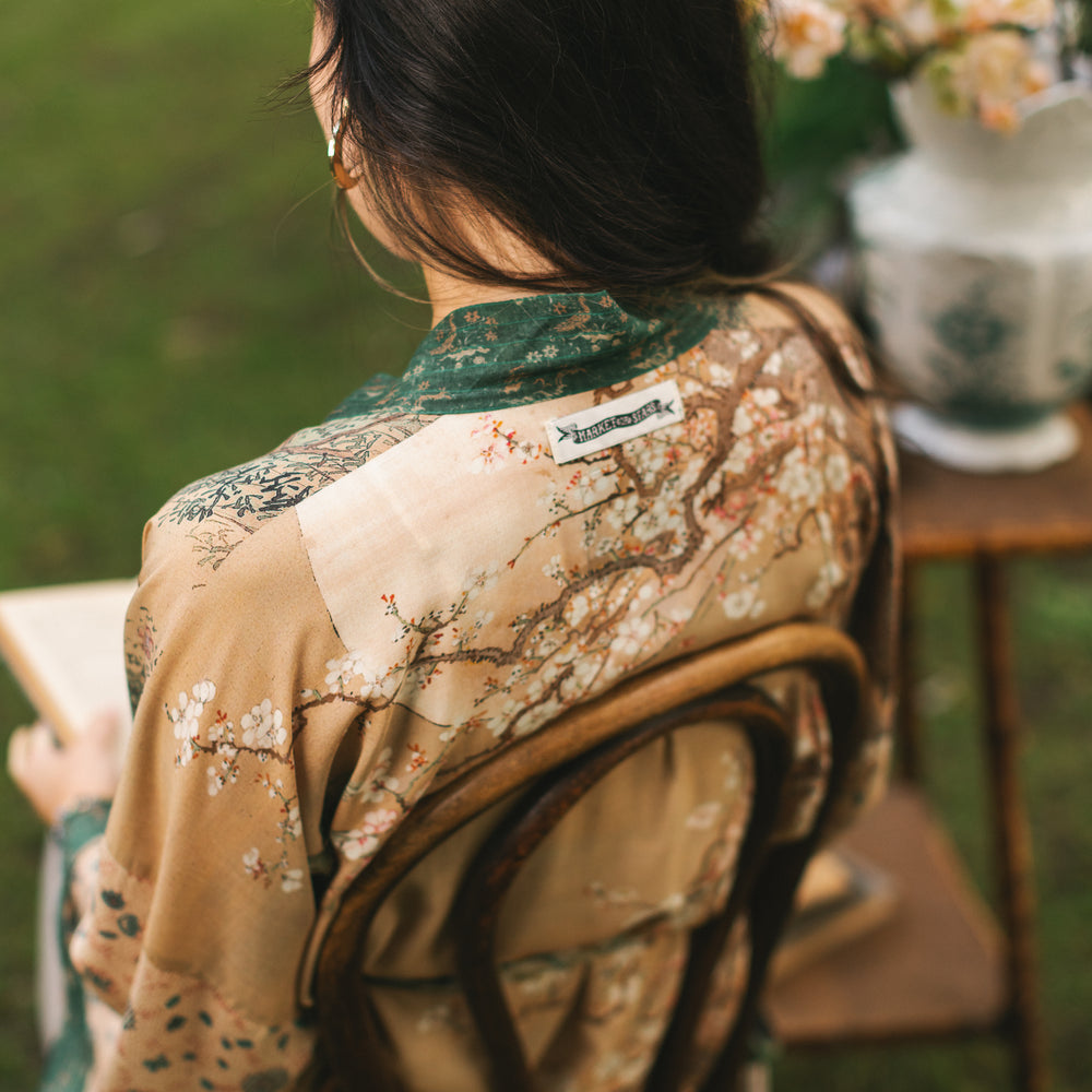 
                  
                    Fable mid-length bamboo blend duster featuring antique Japanese art, cherry and peach blossoms, nightingales, deer, and French block prints - Market of Stars
                  
                