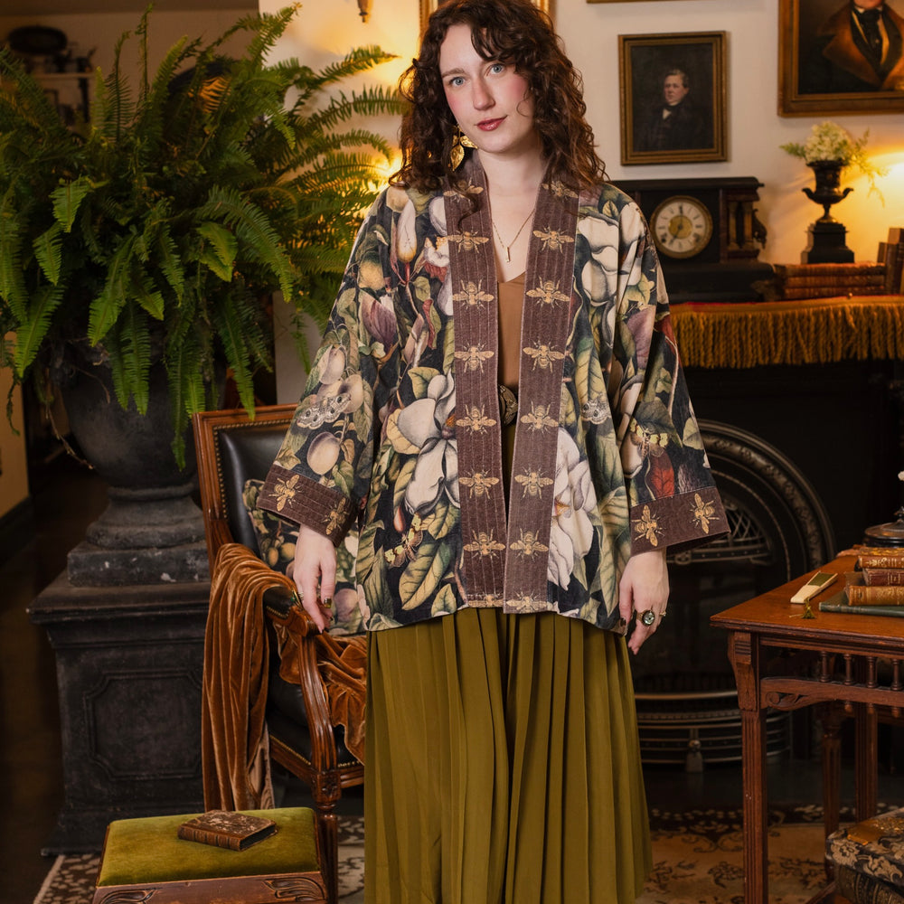 
                  
                    Model wearing a soft cotton velvet duster ft. vintage lithographs of magnolias & 1800's etchings of moths and pears - Market of Stars
                  
                