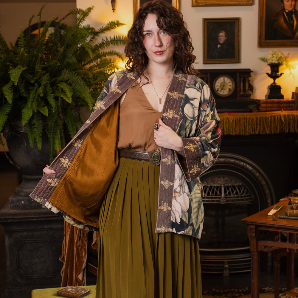 
                  
                    Model wearing a soft cotton velvet duster ft. vintage lithographs of magnolias & 1800's etchings of moths and pears - Market of Stars
                  
                