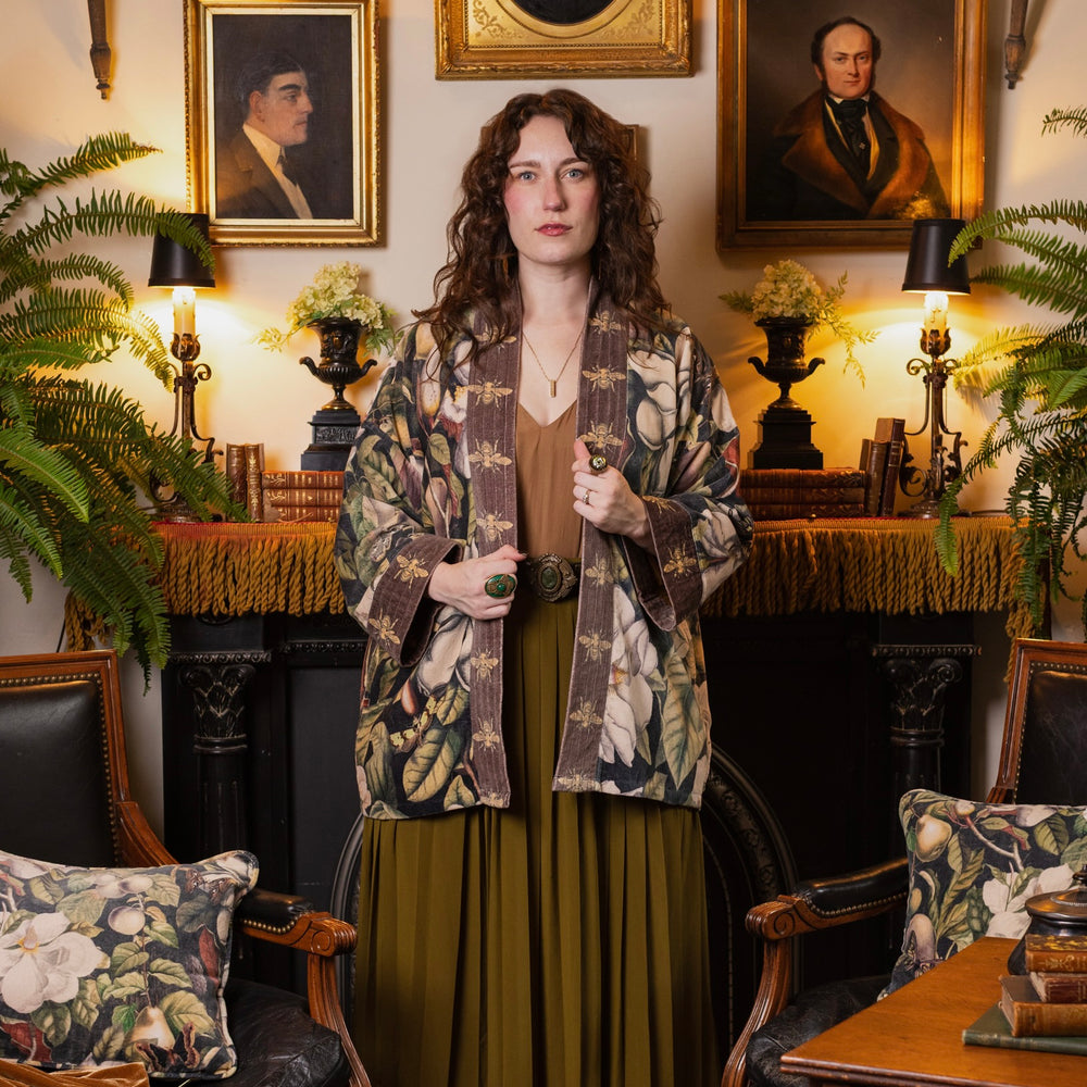 
                  
                    Model wearing a soft cotton velvet duster ft. vintage lithographs of magnolias & 1800's etchings of moths and pears - Market of Stars
                  
                