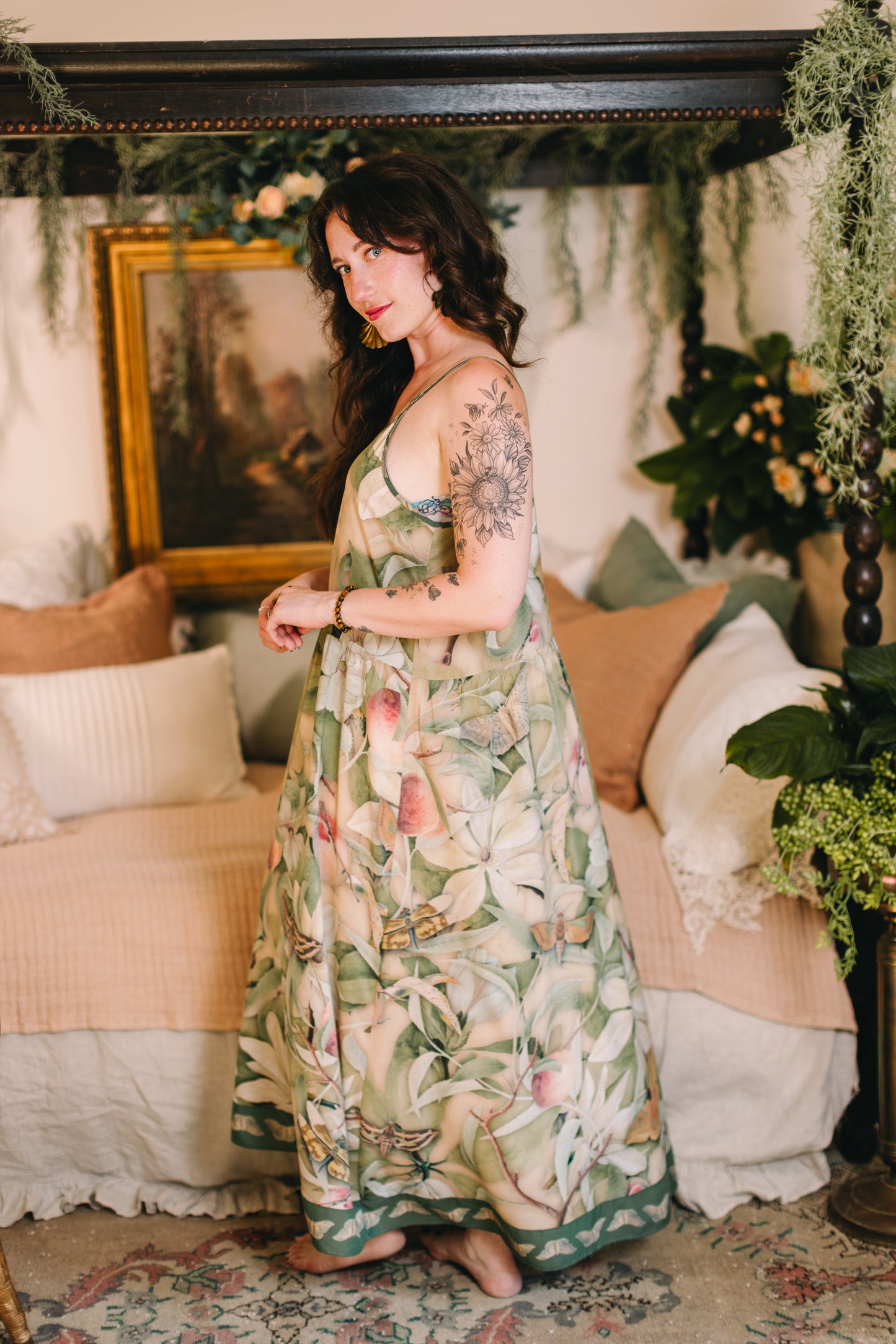 Model wearing a maxi-length slip dress inspired by antique florals, butterflies, and sunlit gardens, this flowing duster captures the warmth and magic of golden hour - Market of Stars
