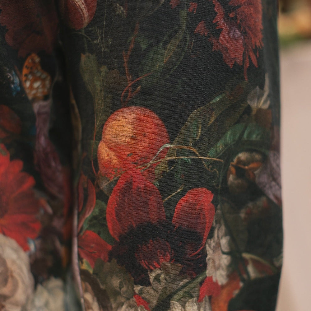 
                  
                    Model wearing the Folklore Artist Pant featuring the Bird-of-Peace embroidery and unfinished William Morris textile designs—artful linen blend pants by Market of Stars.
                  
                